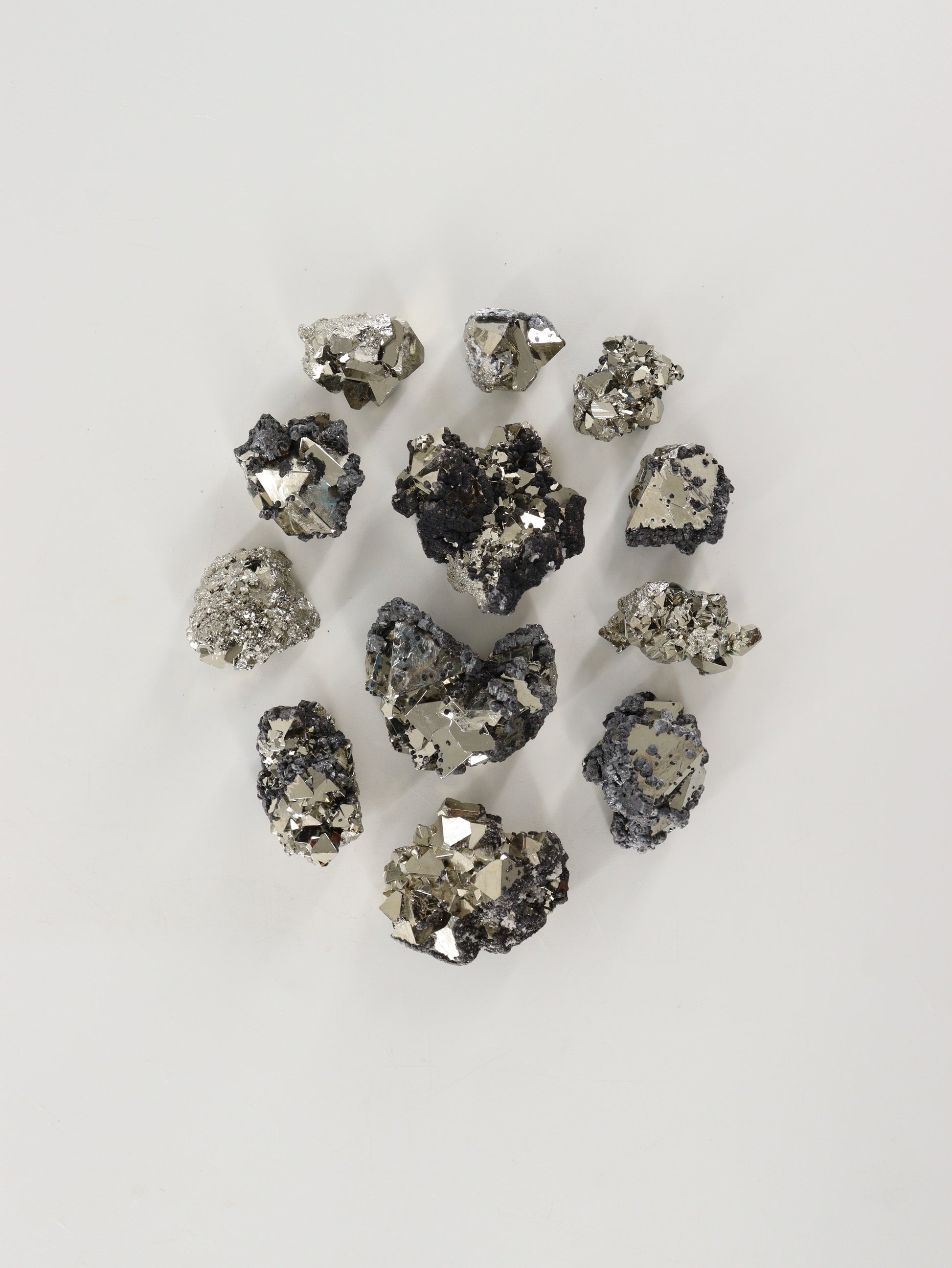 Rough Octahedral Pyrite Set of 12 - Expert Wholesale and Supplier of Wholesale Crystals & Bulk Gemstones, ["close_70"]