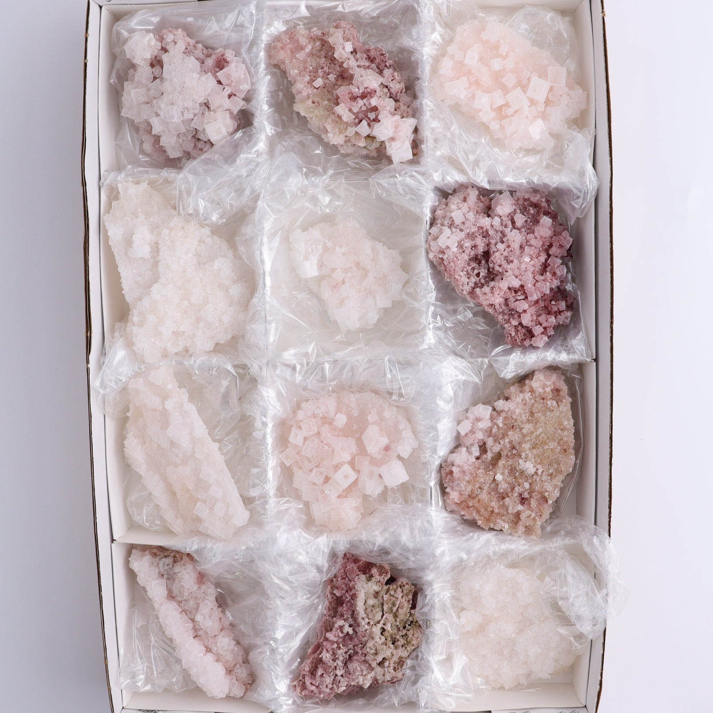 Pink Halite Set of 12 - Expert Wholesale and Supplier of Wholesale Crystals & Bulk Gemstones, ["Flats","Halite","Pink Halite","United States"]