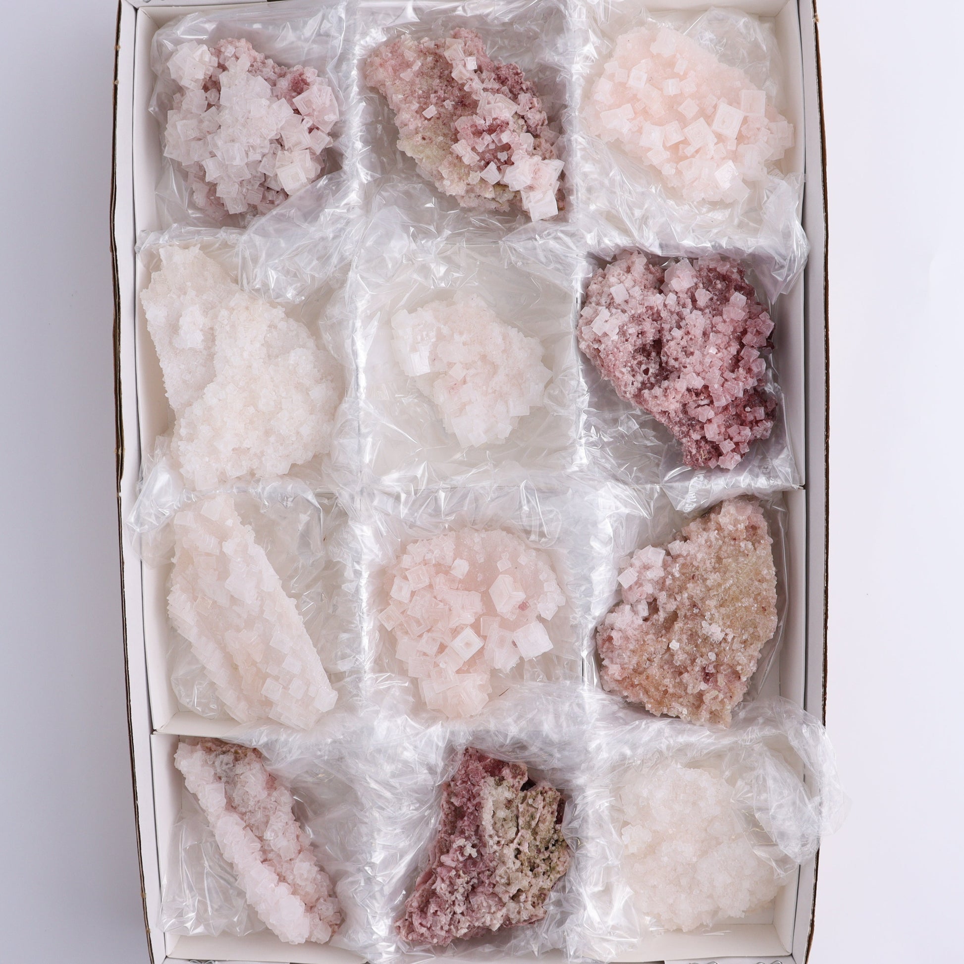 Pink Halite Set of 12 - Expert Wholesale and Supplier of Wholesale Crystals & Bulk Gemstones, ["Flats","Halite","Pink Halite","United States"]