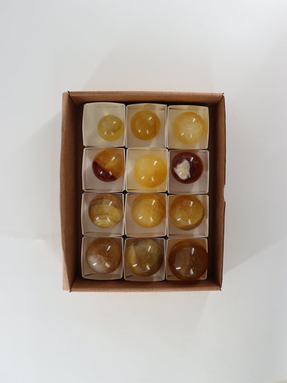 Fluorite Spheres Set of 12 - Expert Wholesale and Supplier of Wholesale Crystals & Bulk Gemstones, []