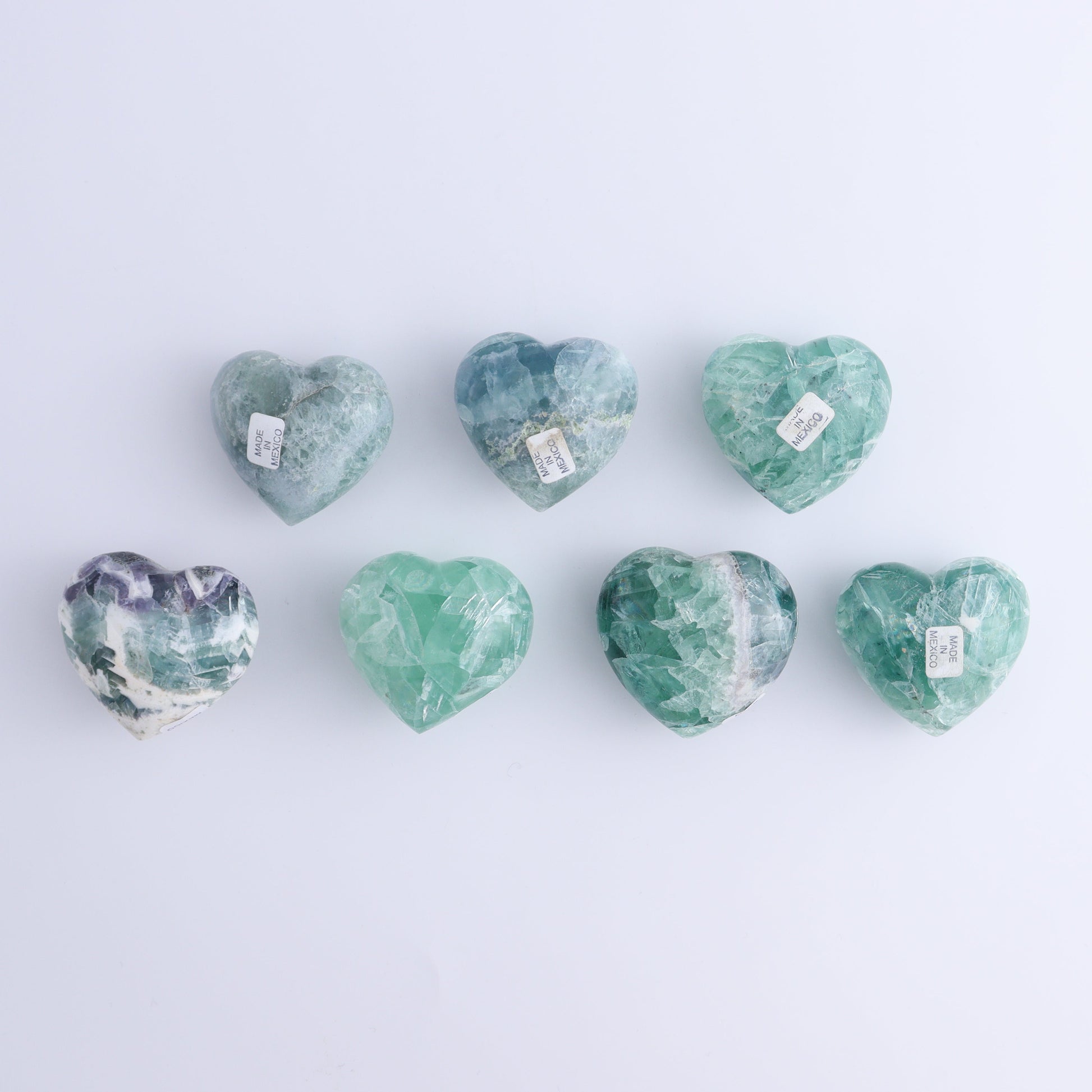 Fluorite Hearts Set of 7 - Expert Wholesale and Supplier of Wholesale Crystals & Bulk Gemstones, ["Fluorite","Hearts","Mexico"]