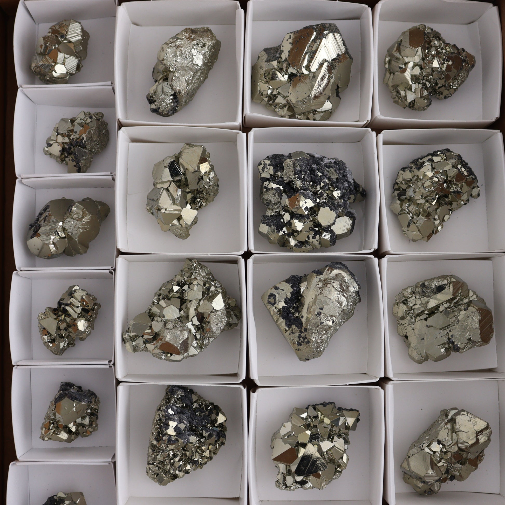 Octahedral Pyrite Clusters Set of 22 - Expert Wholesale and Supplier of Wholesale Crystals & Bulk Gemstones, ["Clusters","Octahedral Pyrite","Peru","Pyrite"]