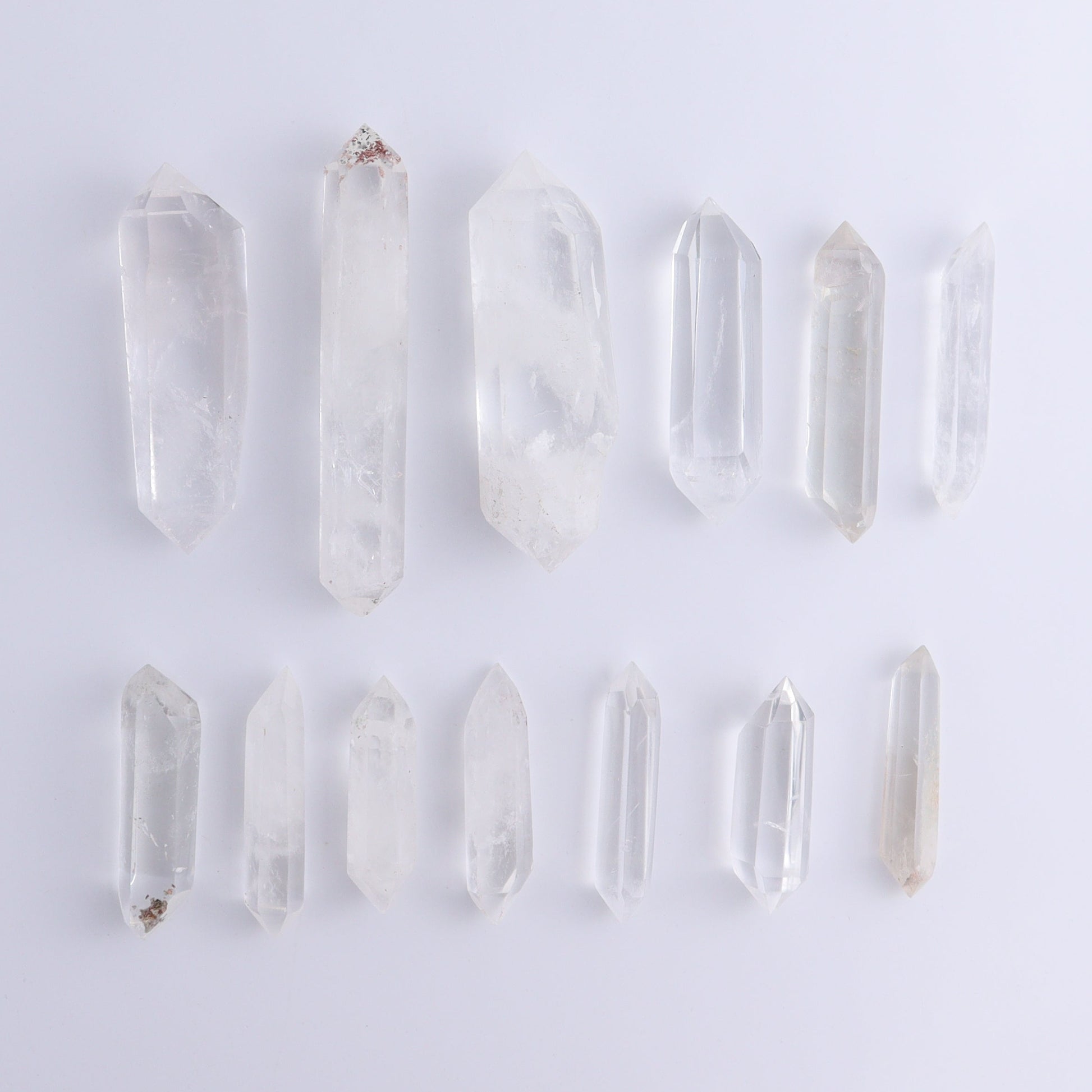 Quartz Faceted Double Points Set of 13 - Expert Wholesale and Supplier of Wholesale Crystals & Bulk Gemstones, ["Brazil","Clear Quartz","Mixed Carvings","Quartz"]