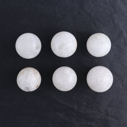 One Small White Quartz Sphere