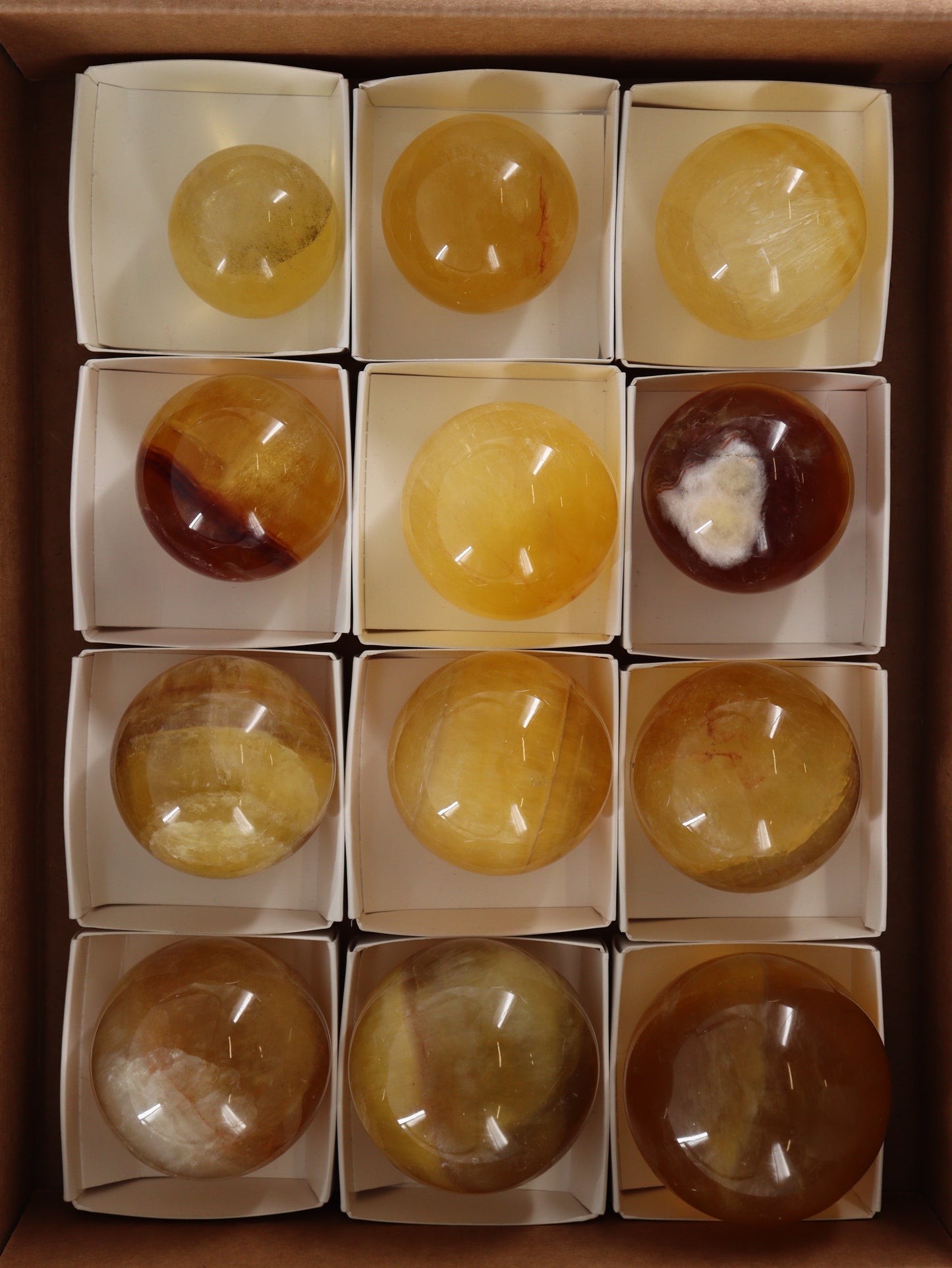 Fluorite Spheres Set of 12 - Expert Wholesale and Supplier of Wholesale Crystals & Bulk Gemstones, []