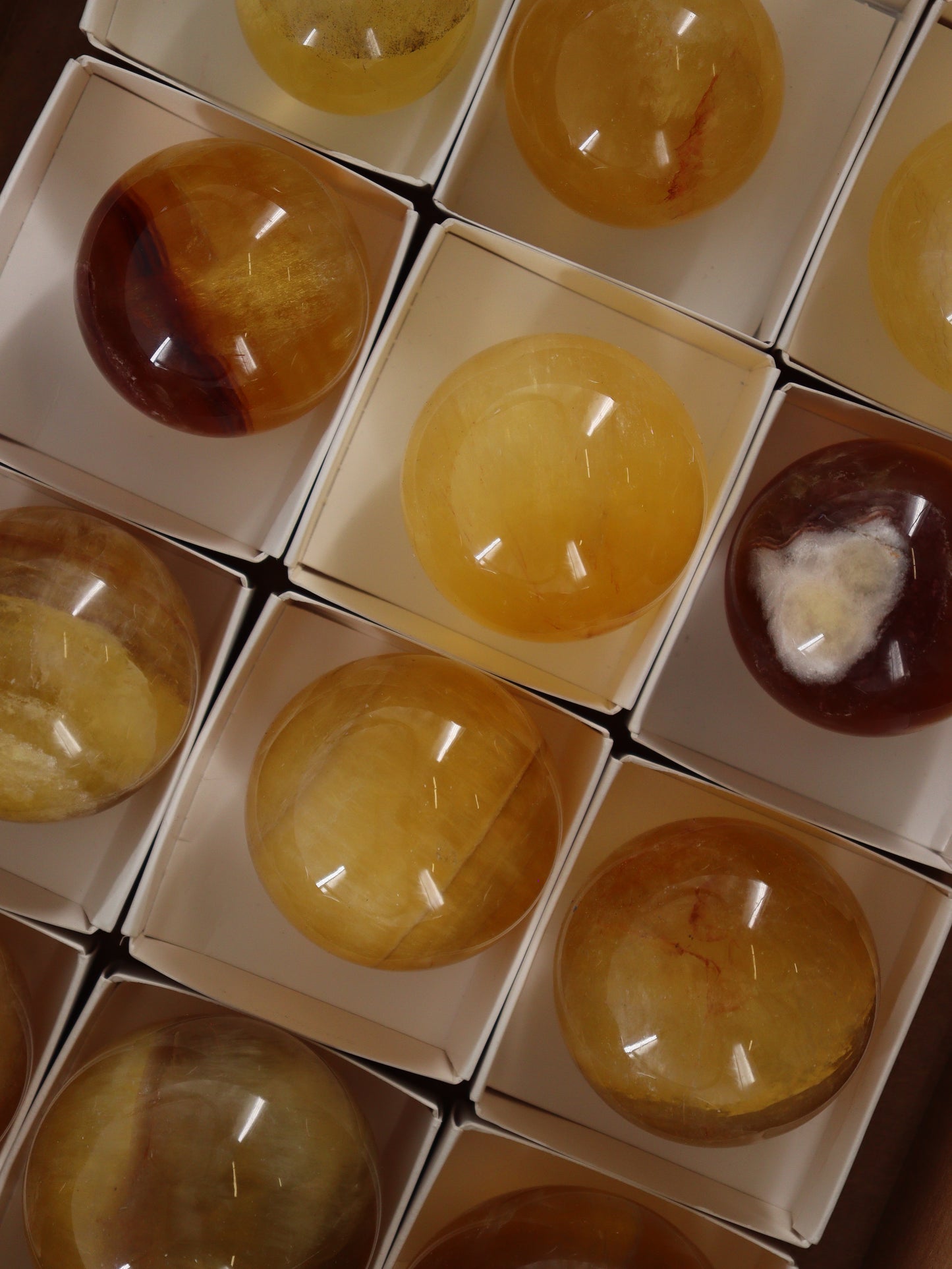 Fluorite Spheres Set of 12 - Expert Wholesale and Supplier of Wholesale Crystals & Bulk Gemstones, []