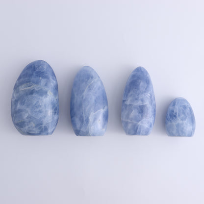 Blue Calcite Freeforms Set of 4 - Expert Wholesale and Supplier of Wholesale Crystals & Bulk Gemstones, ["Blue Calcite","Calcite","close_30","Freeform","Freeforms"]