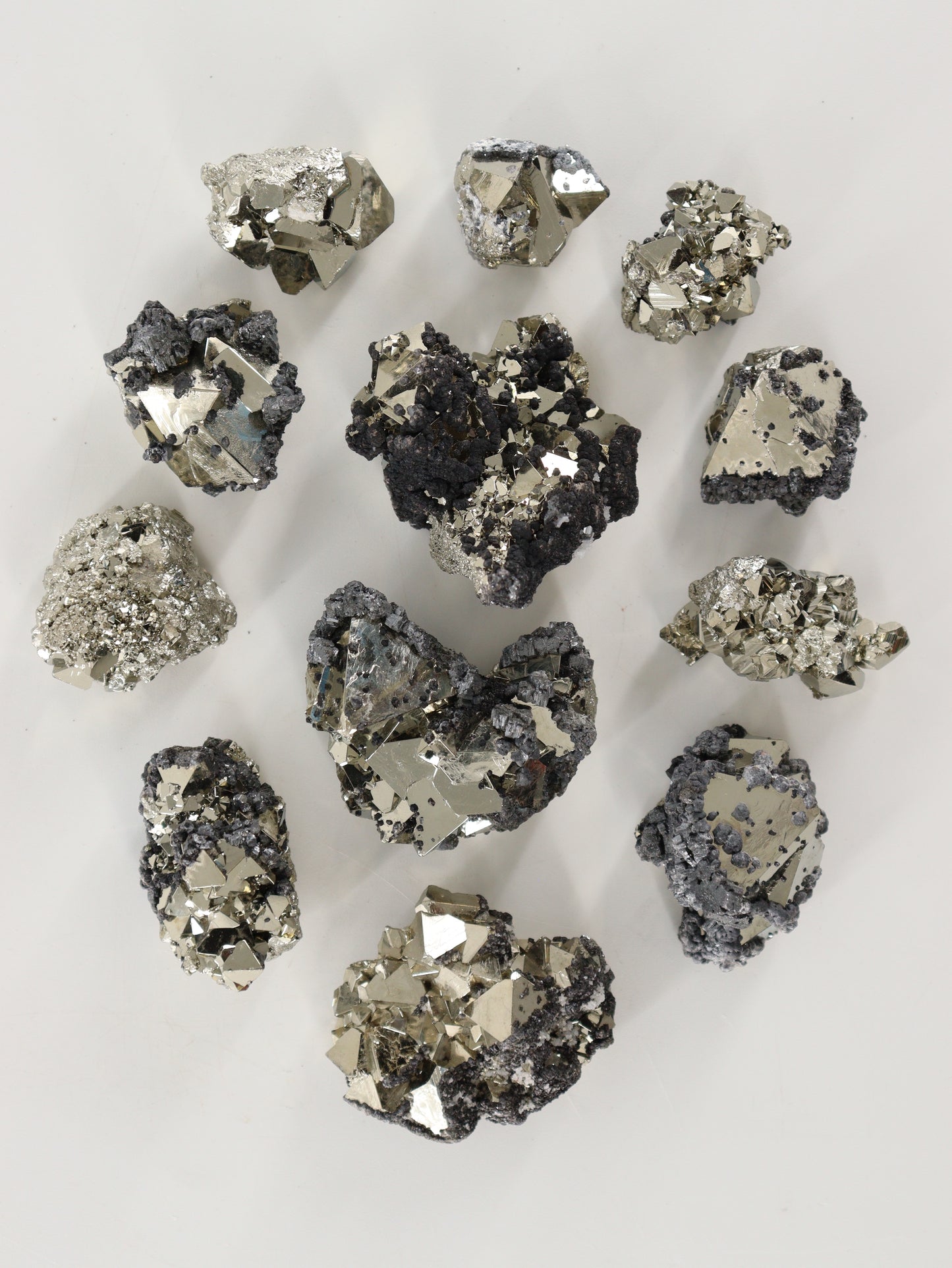 Rough Octahedral Pyrite Set of 12 - Expert Wholesale and Supplier of Wholesale Crystals & Bulk Gemstones, ["close_70"]