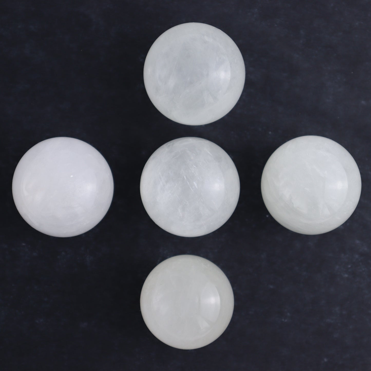Optical Calcite Spheres Set of 12 - Expert Wholesale and Supplier of Wholesale Crystals & Bulk Gemstones, ["Calcite","Mexico","Optical Calcite","Spheres"]