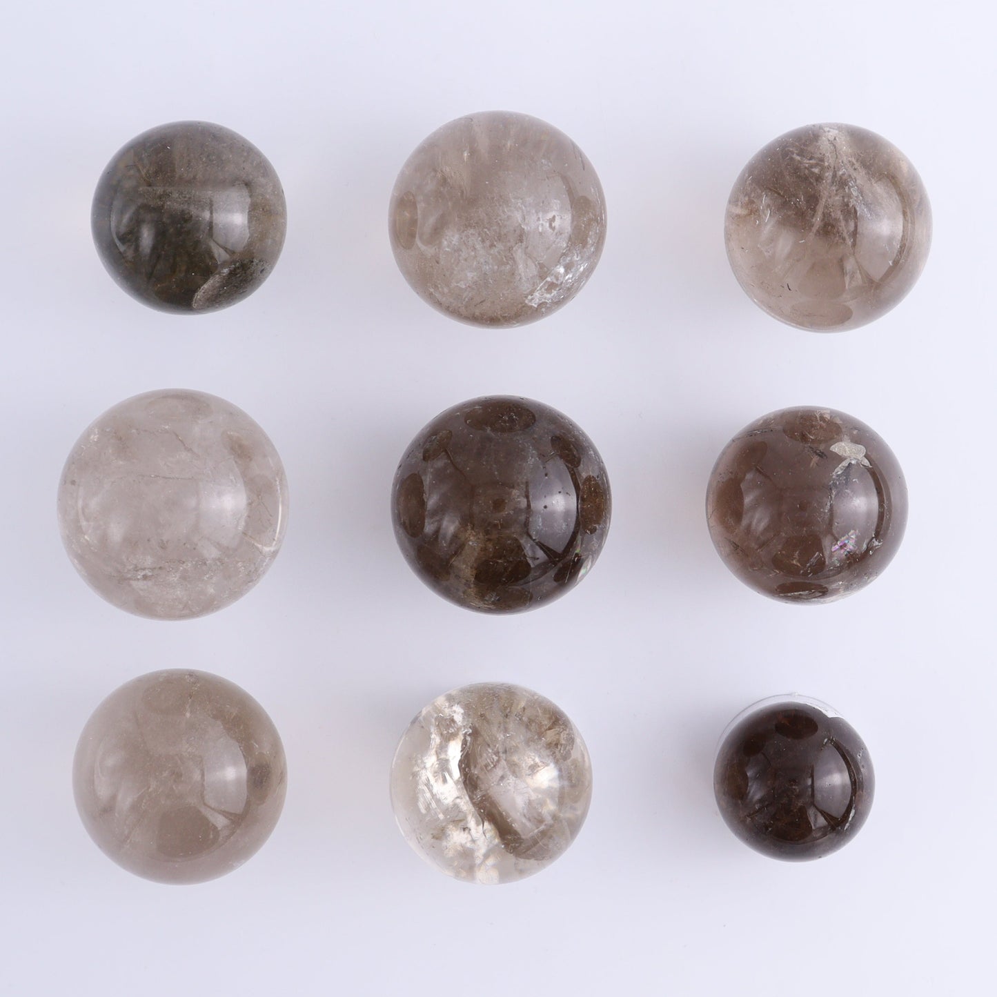 Smoky Quartz Spheres Set of 9 - Expert Wholesale and Supplier of Wholesale Crystals & Bulk Gemstones, ["Quartz","Smoky Quartz","Spheres"]