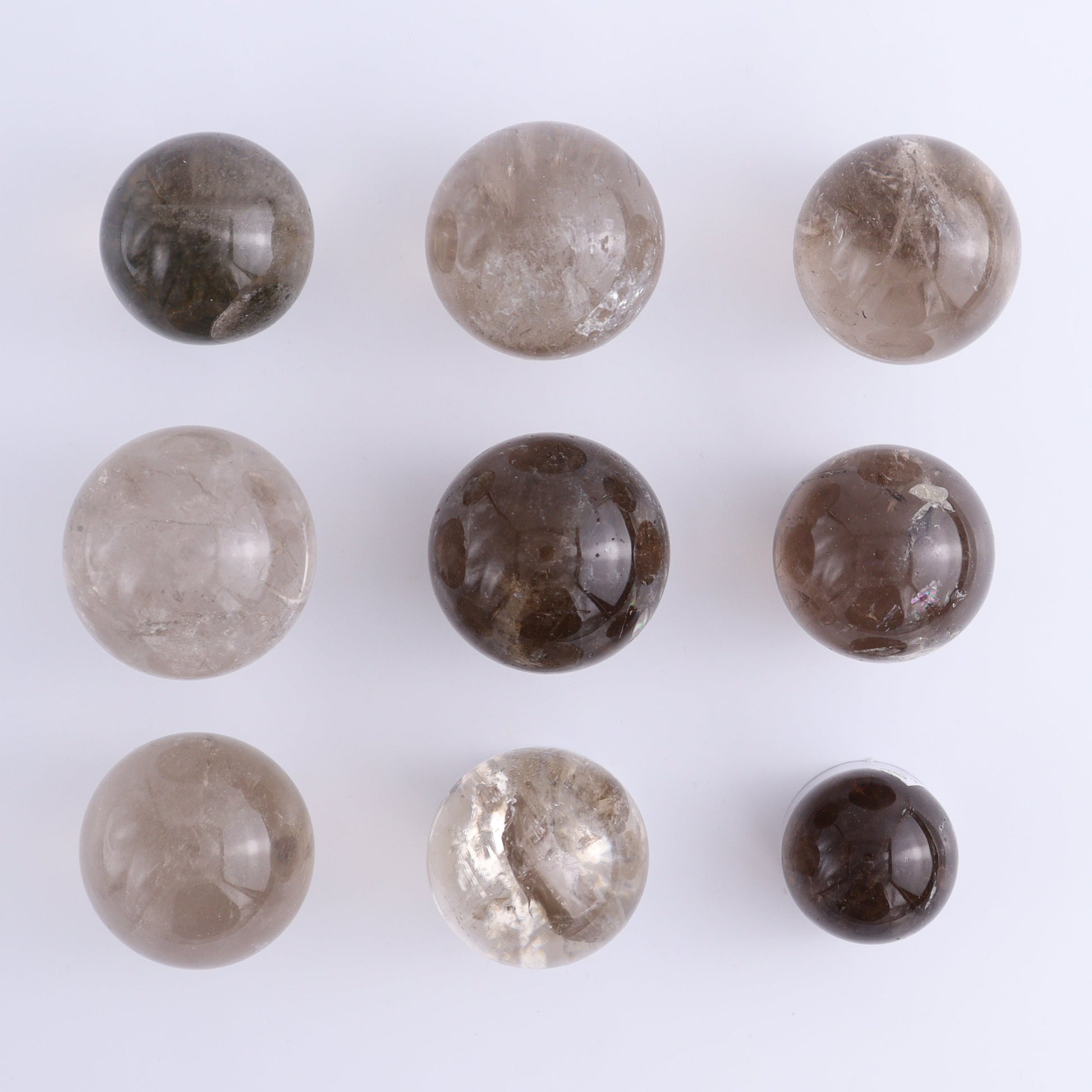 Smoky Quartz Spheres Set of 9 - Expert Wholesale and Supplier of Wholesale Crystals & Bulk Gemstones, ["Quartz","Smoky Quartz","Spheres"]
