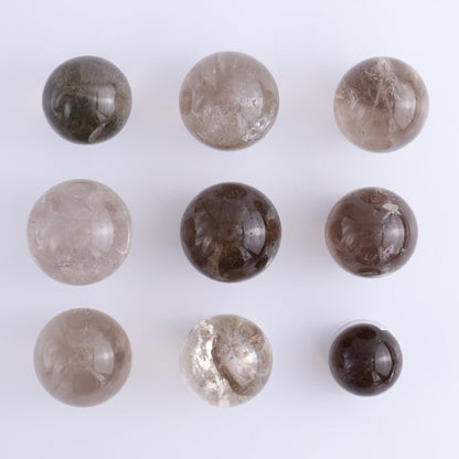 Smoky Quartz Spheres Set of 9 - Expert Wholesale and Supplier of Wholesale Crystals & Bulk Gemstones, ["Quartz","Smoky Quartz","Spheres"]