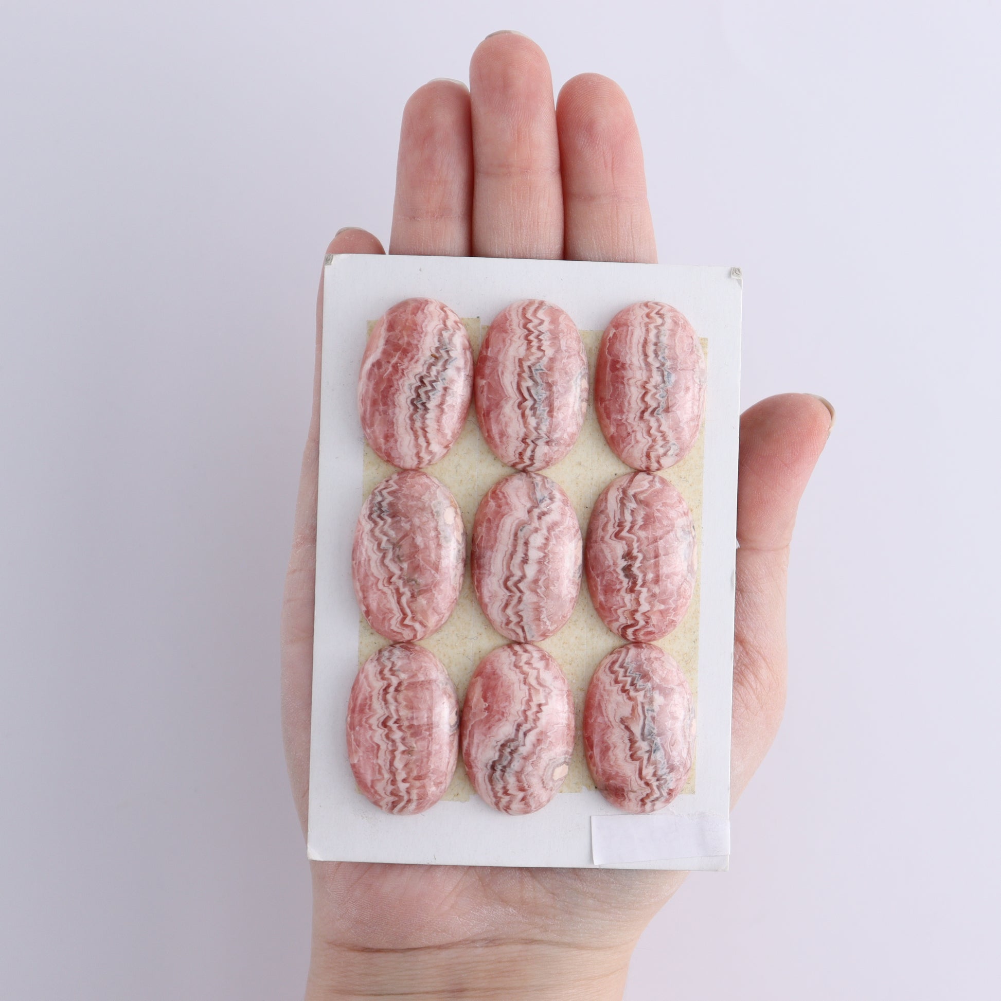 Rhodocrosite Cabs Set of 9 - Expert Wholesale and Supplier of Wholesale Crystals & Bulk Gemstones, ["Cabs","Rhodochrosite"]