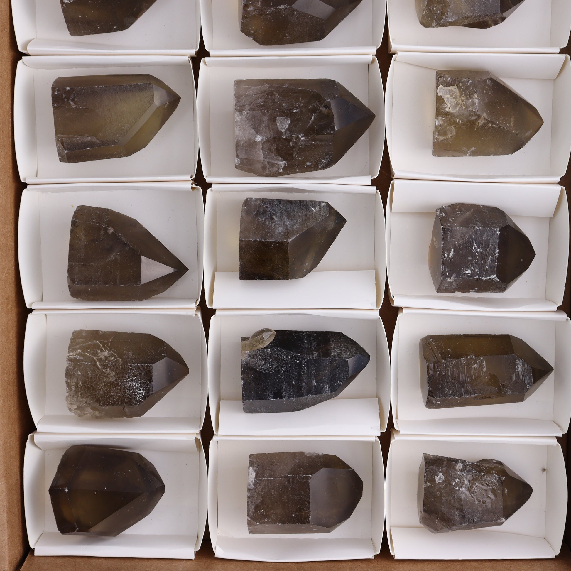 Smoky Quartz Polished Tops Set of 18 - Expert Wholesale and Supplier of Wholesale Crystals & Bulk Gemstones, ["Brazil","close_70","Points","Polished Tip","Quartz","Smoky Quartz"]