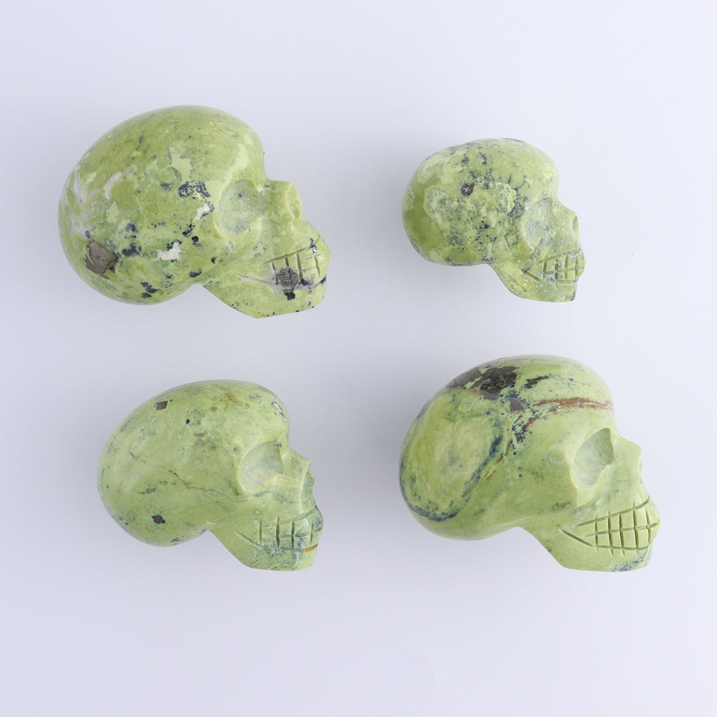 Serpentine Skulls Set of 4