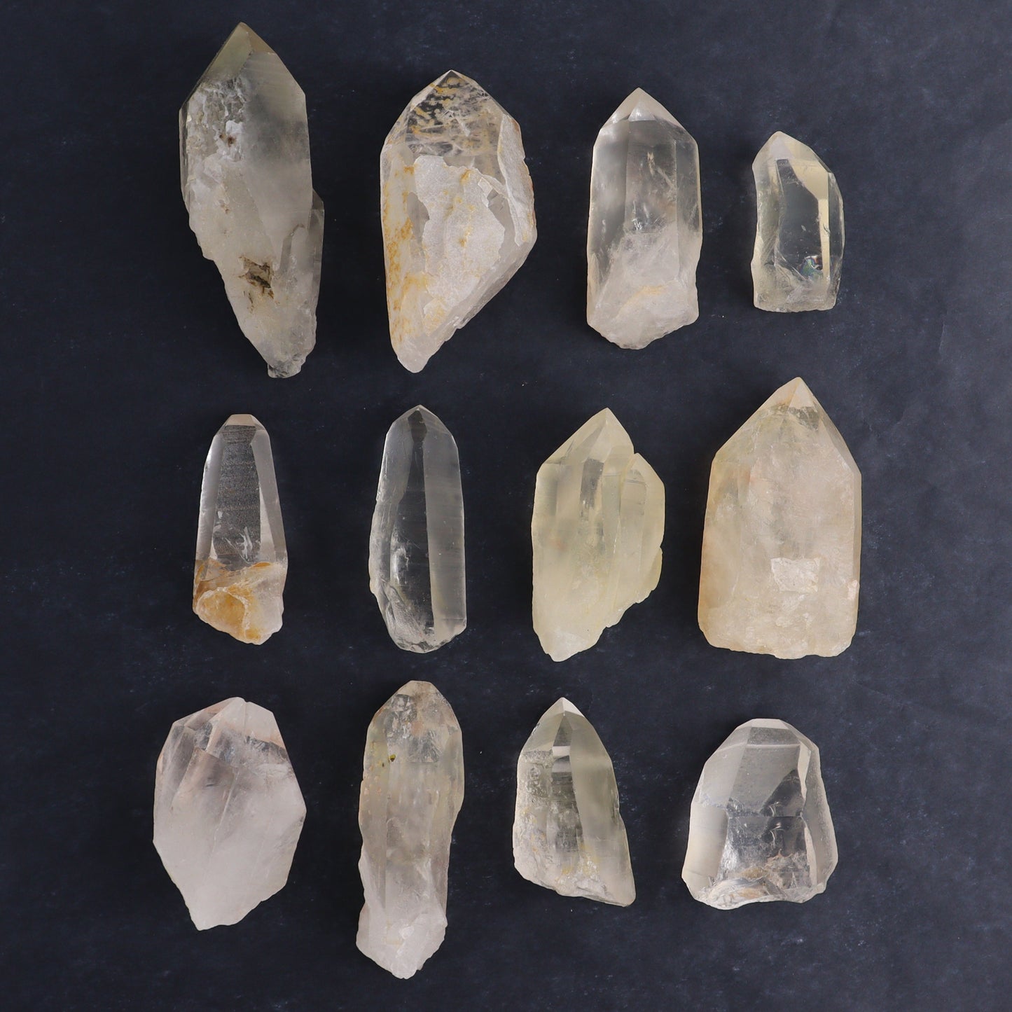 Lemurian Rough Towers Set of 12 - Expert Wholesale and Supplier of Wholesale Crystals & Bulk Gemstones, ["Lemurian","Rough","Towers"]