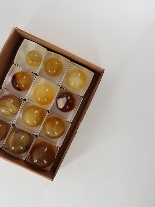 Fluorite Spheres Set of 12 - Expert Wholesale and Supplier of Wholesale Crystals & Bulk Gemstones, []