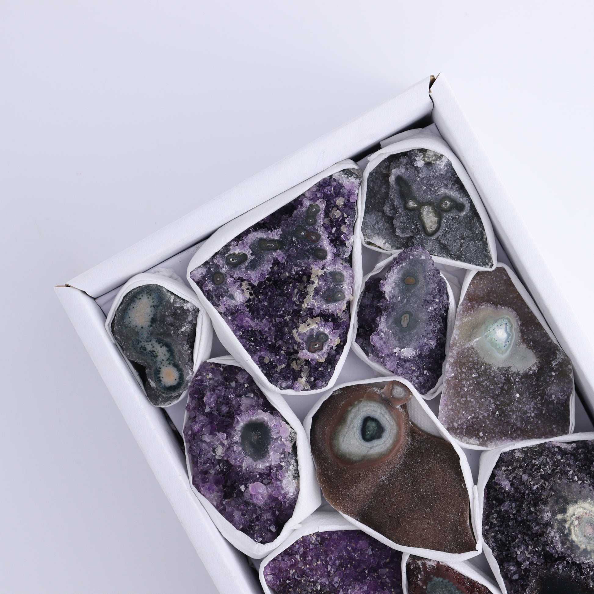 Uruguay Amethyst Clusters with "Eyes" Flat of 11 - Expert Wholesale and Supplier of Wholesale Crystals & Bulk Gemstones, ["Amethyst","Clusters","Eyes Amethyst","Uruguay"]