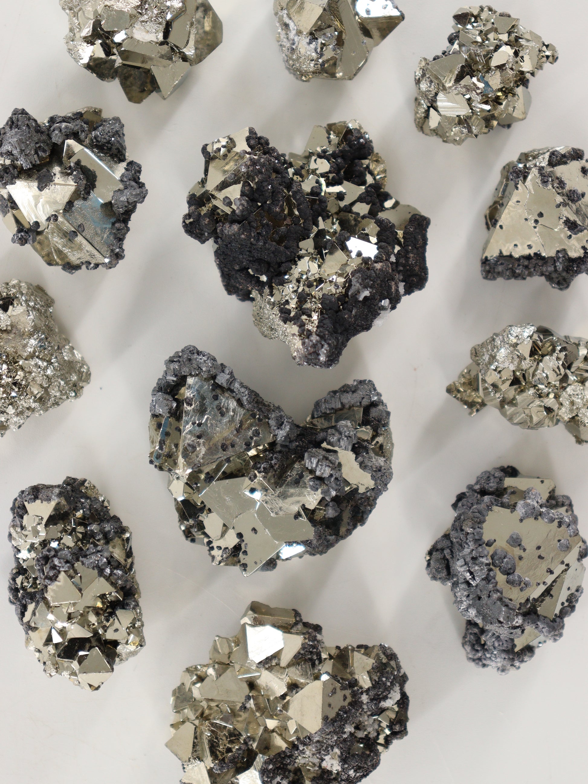 Rough Octahedral Pyrite Set of 12 - Expert Wholesale and Supplier of Wholesale Crystals & Bulk Gemstones, ["close_70"]