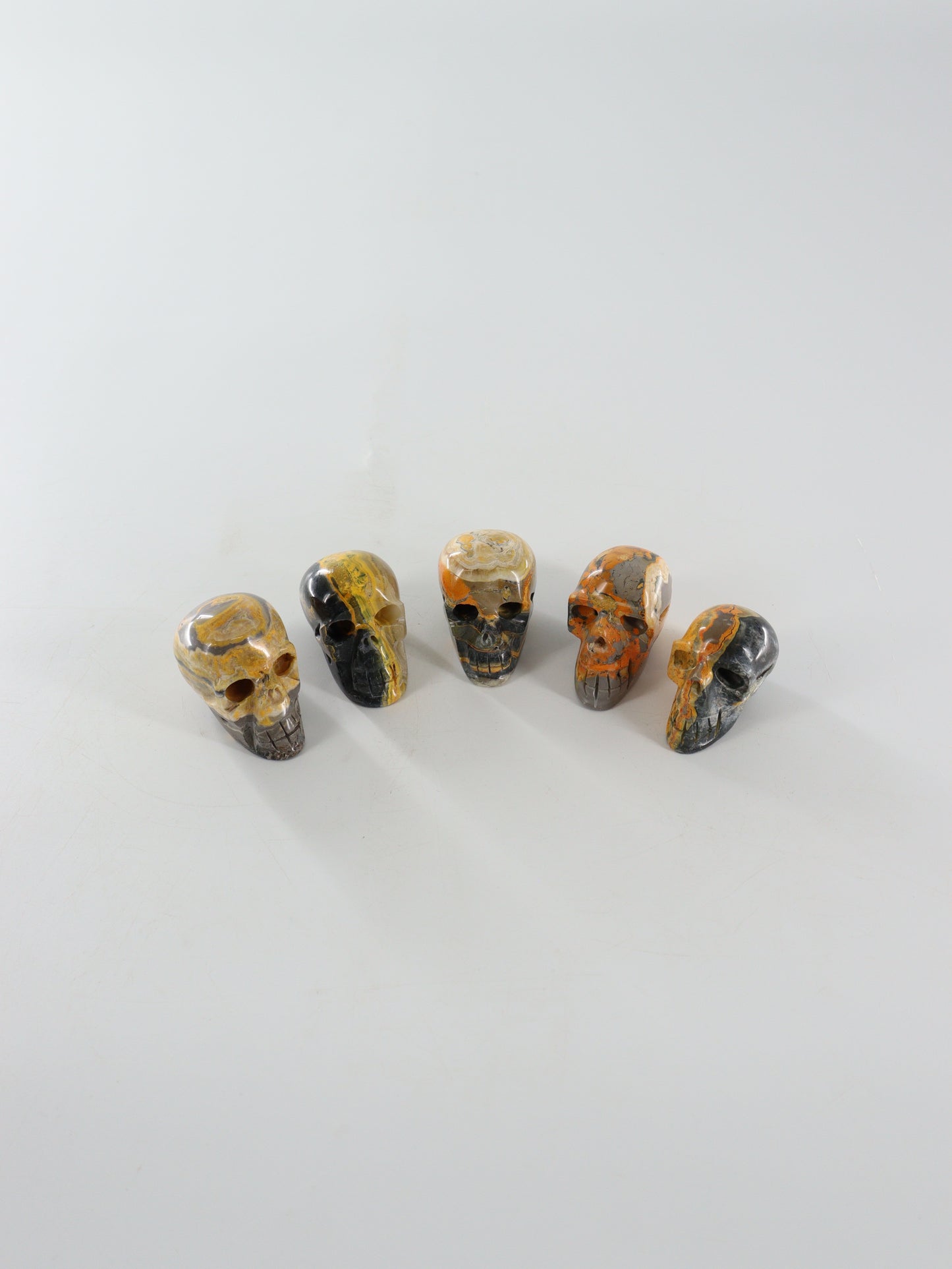 Bumblebee Jasper Skulls Set of 5 - Expert Wholesale and Supplier of Wholesale Crystals & Bulk Gemstones, []