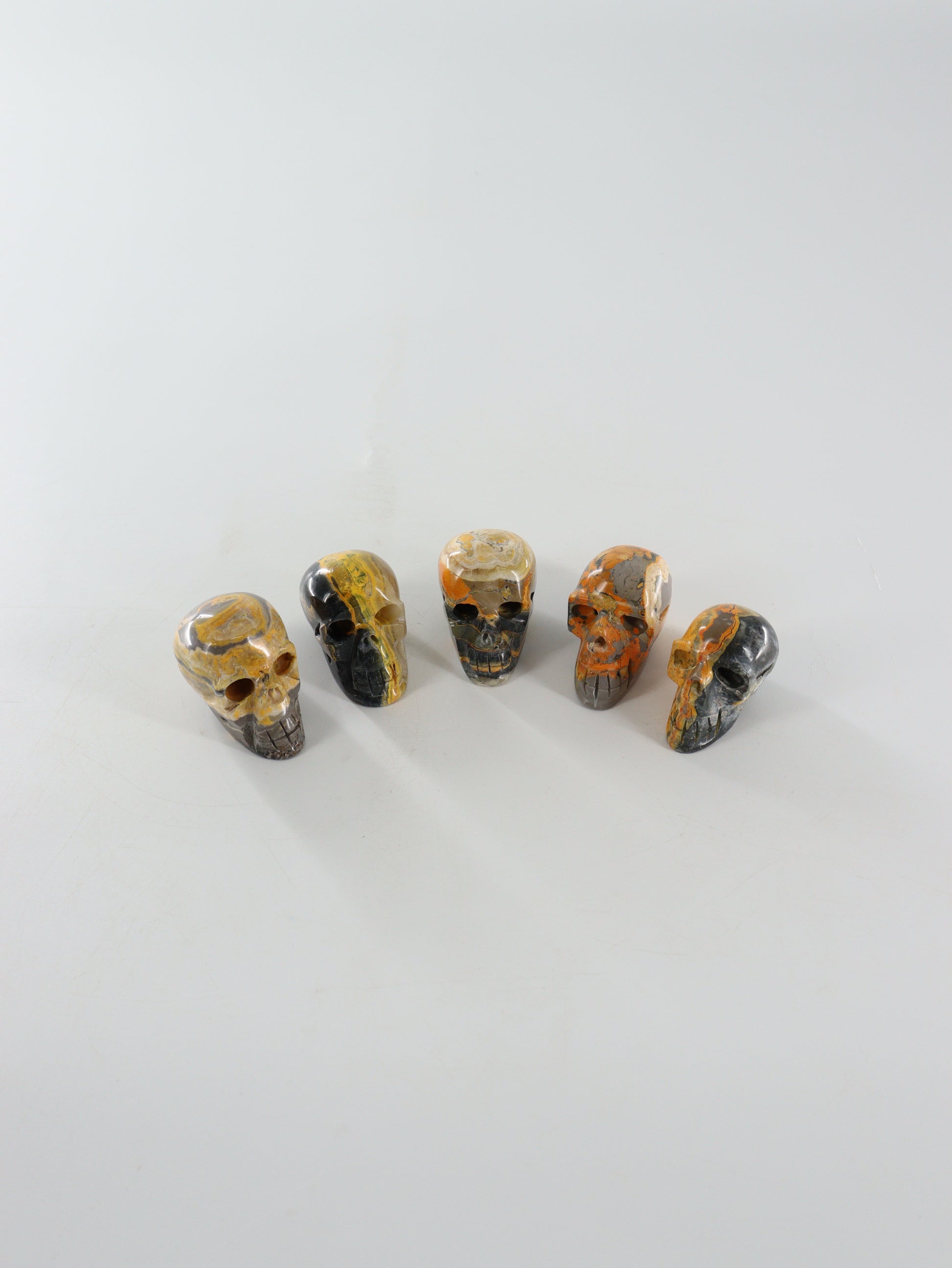 Bumblebee Jasper Skulls Set of 5 - Expert Wholesale and Supplier of Wholesale Crystals & Bulk Gemstones, []