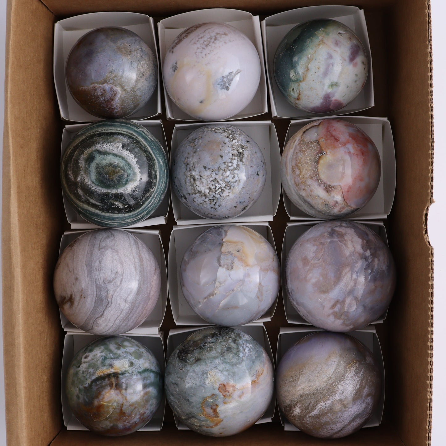 Ocean Jasper Spheres Set of 12 - Expert Wholesale and Supplier of Wholesale Crystals & Bulk Gemstones, ["jasper","Madagascar","Ocean Jasper","Spheres"]