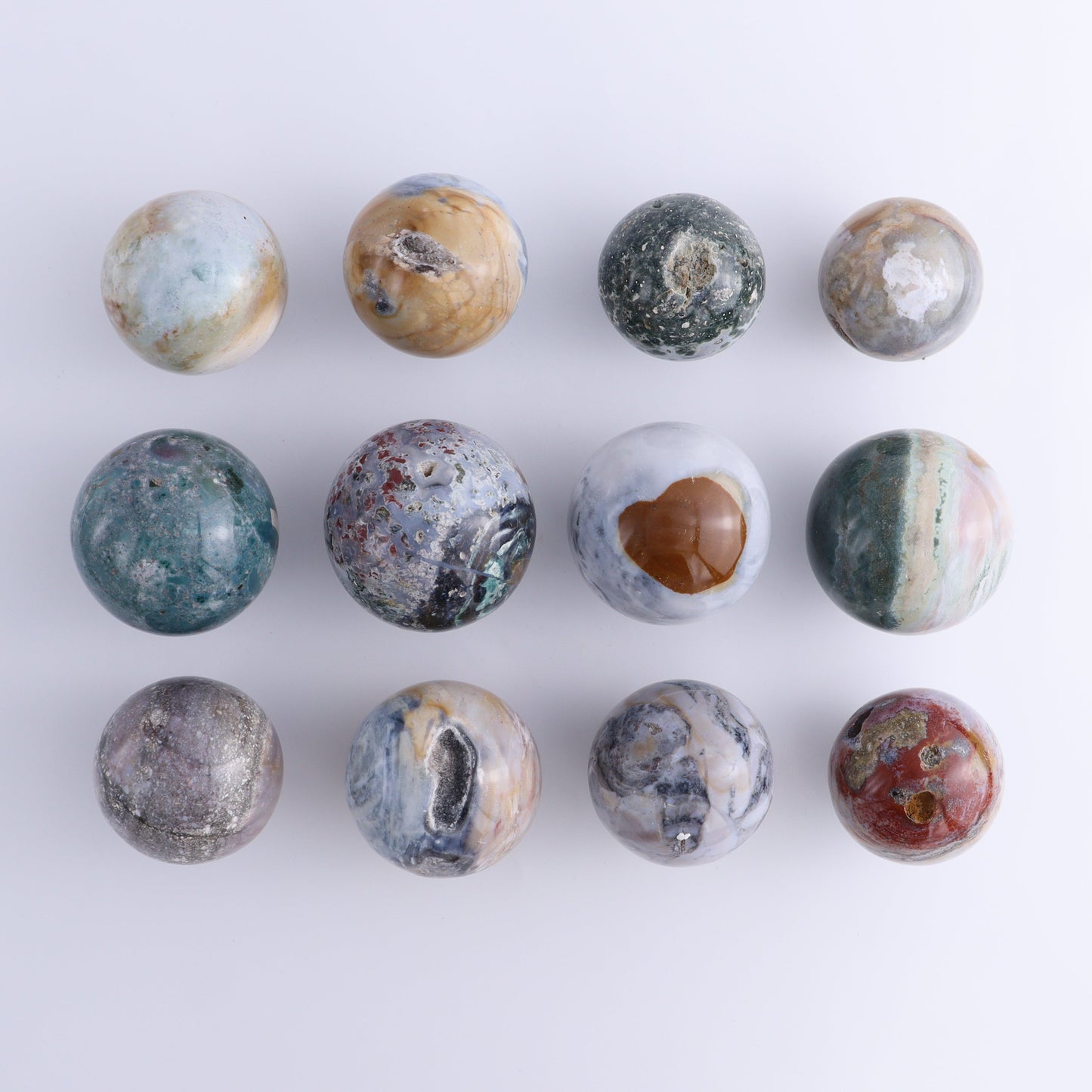 Ocean Jasper Spheres Set of 12 - Expert Wholesale and Supplier of Wholesale Crystals & Bulk Gemstones, ["jasper","Madagascar","Ocean Jasper","Spheres"]