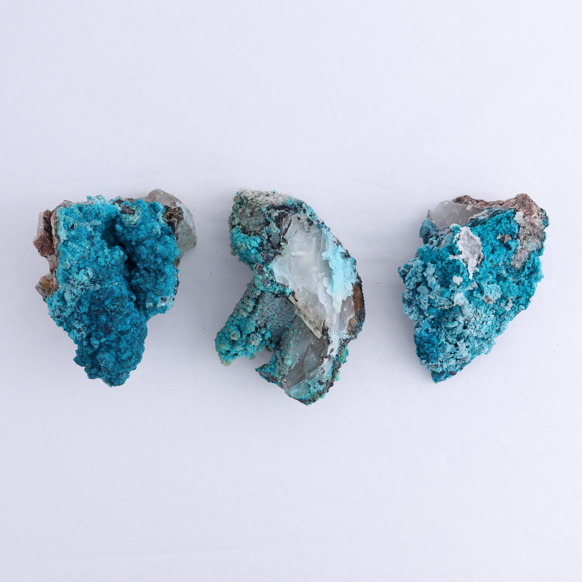 Chrysocolla on Quartz Roughs Set of 12 - Expert Wholesale and Supplier of Wholesale Crystals & Bulk Gemstones, ["Chrysocolla","Flats","Freeforms","Peru","Quartz","Rough"]