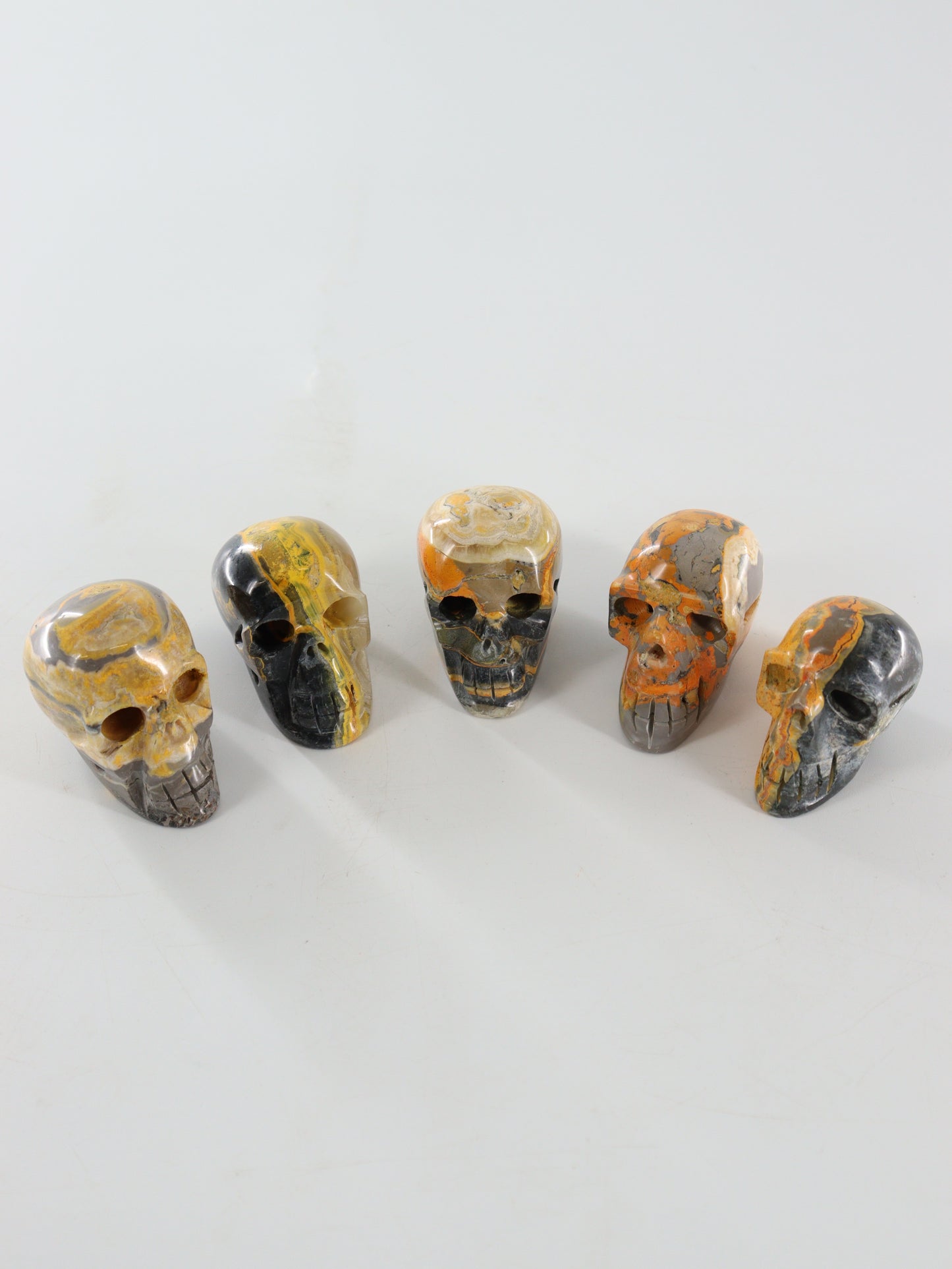 Bumblebee Jasper Skulls Set of 5 - Expert Wholesale and Supplier of Wholesale Crystals & Bulk Gemstones, []