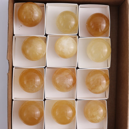 Honey Calcite Spheres Set of 12 - Expert Wholesale and Supplier of Wholesale Crystals & Bulk Gemstones, ["Calcite","Honey Calcite","Mexico","Spheres"]
