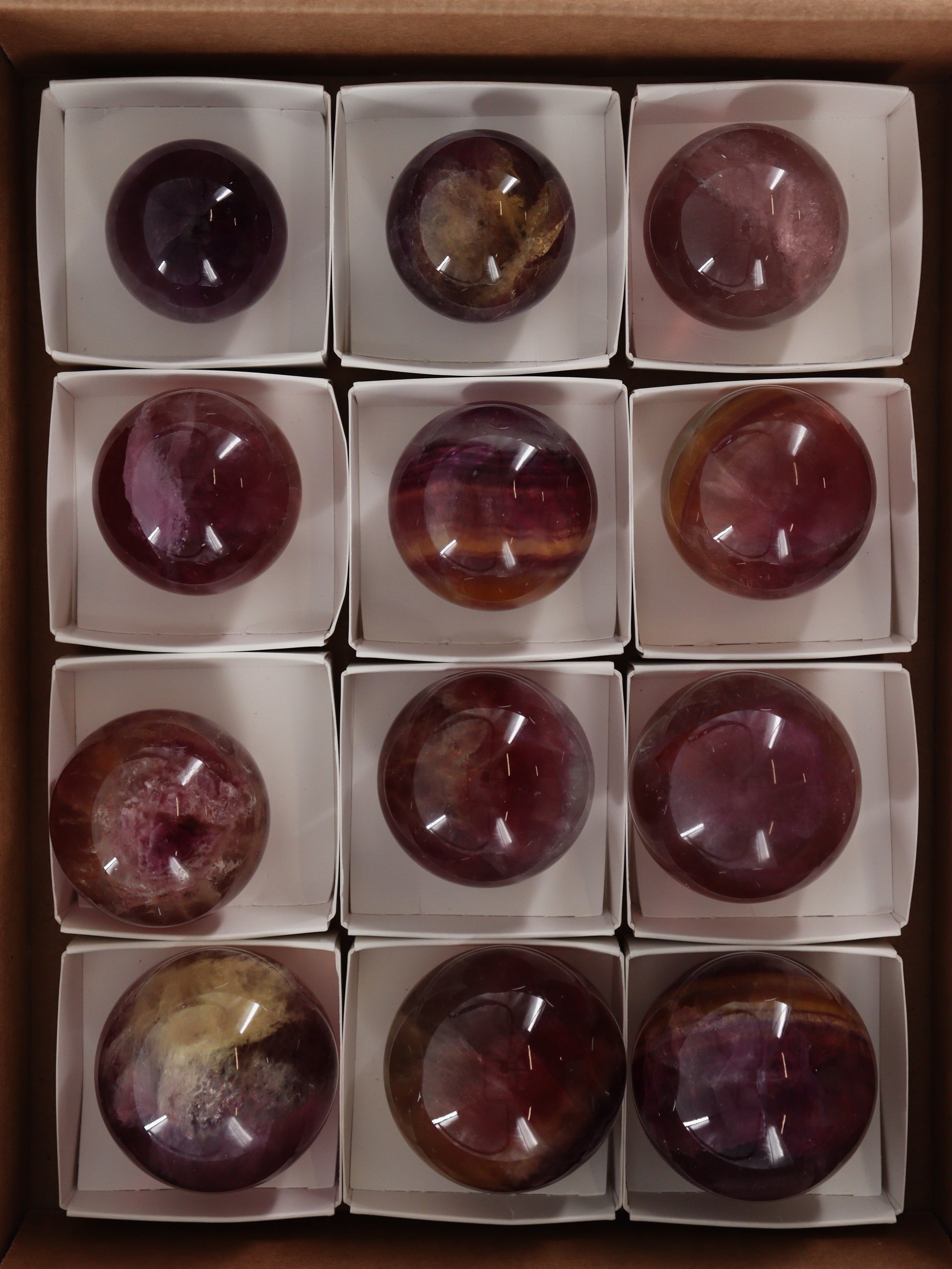 Fluorite Spheres Set of 12 - Expert Wholesale and Supplier of Wholesale Crystals & Bulk Gemstones, []