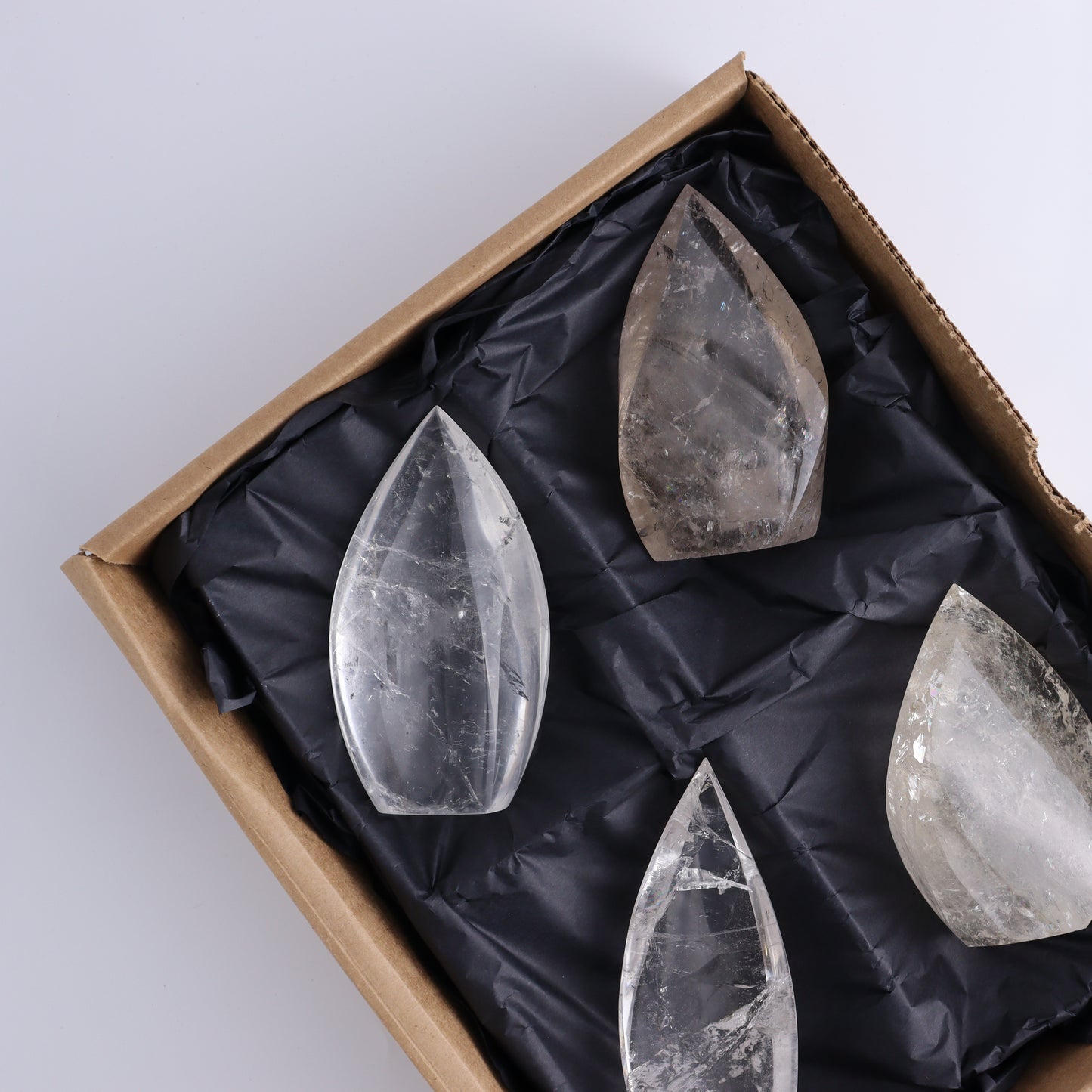 Imperfect Clear and Smoky Quartz Flames Set of 4 - Expert Wholesale and Supplier of Wholesale Crystals & Bulk Gemstones, ["Brazil","Clear Quartz","flames","Quartz"]