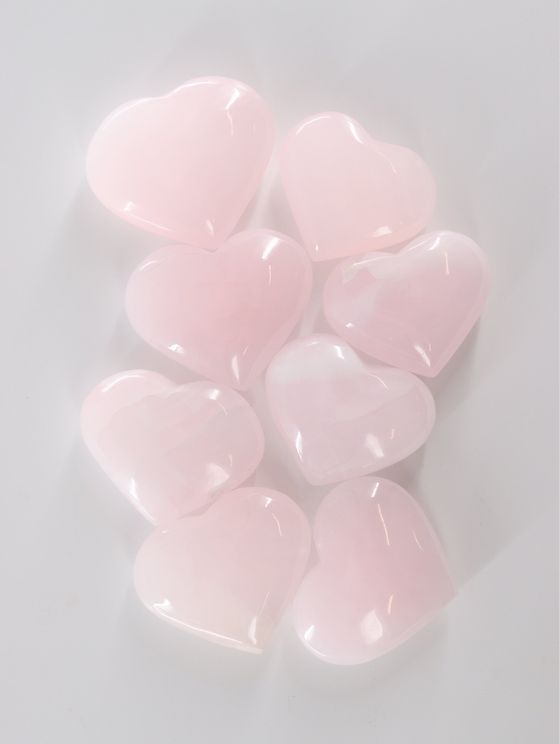 1kg Mangano Calcite Hearts - Expert Supplier of Wholesale Crystals & Bulk Gemstones