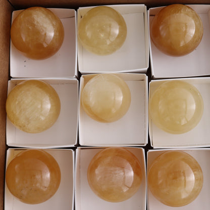 Honey Calcite Spheres Set of 12 - Expert Wholesale and Supplier of Wholesale Crystals & Bulk Gemstones, ["Calcite","Honey Calcite","Mexico","Spheres"]