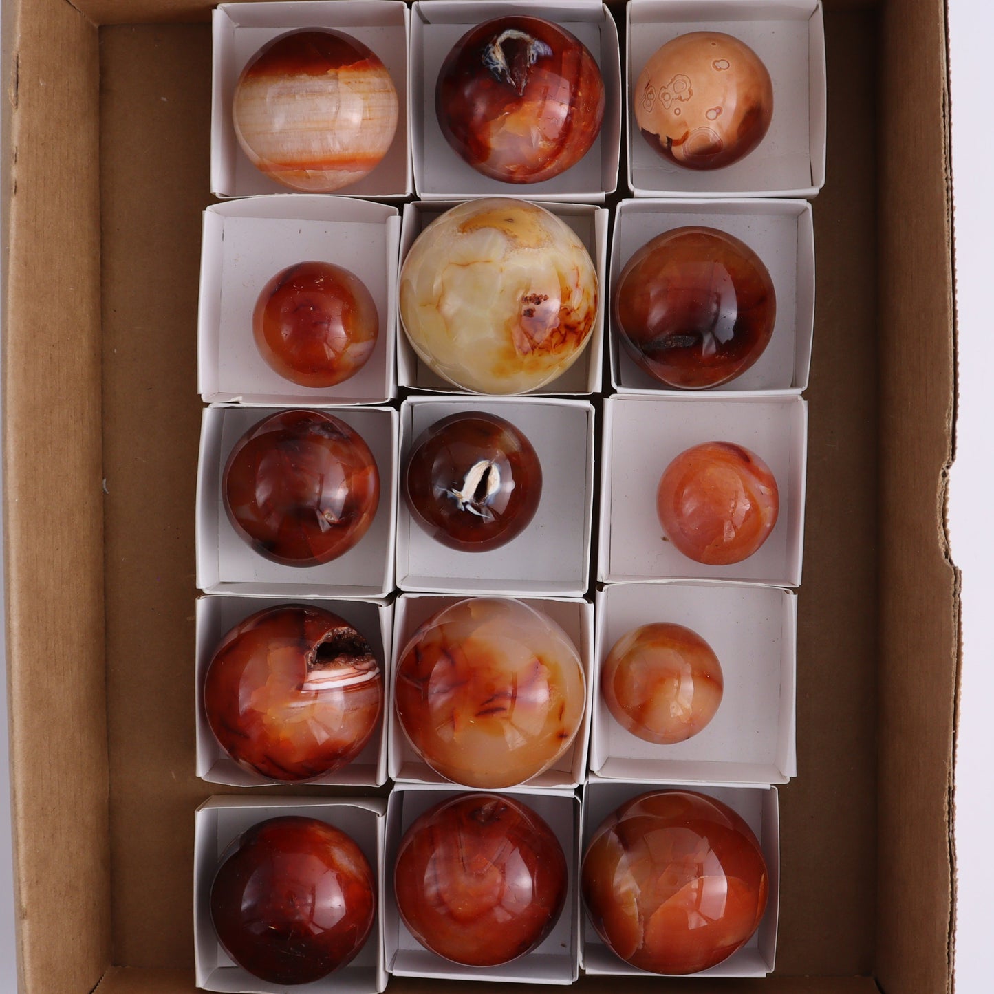 Carnelian Spheres Set of 15 - Expert Wholesale and Supplier of Wholesale Crystals & Bulk Gemstones, ["carnelian","close_30","flames","Madagascar"]