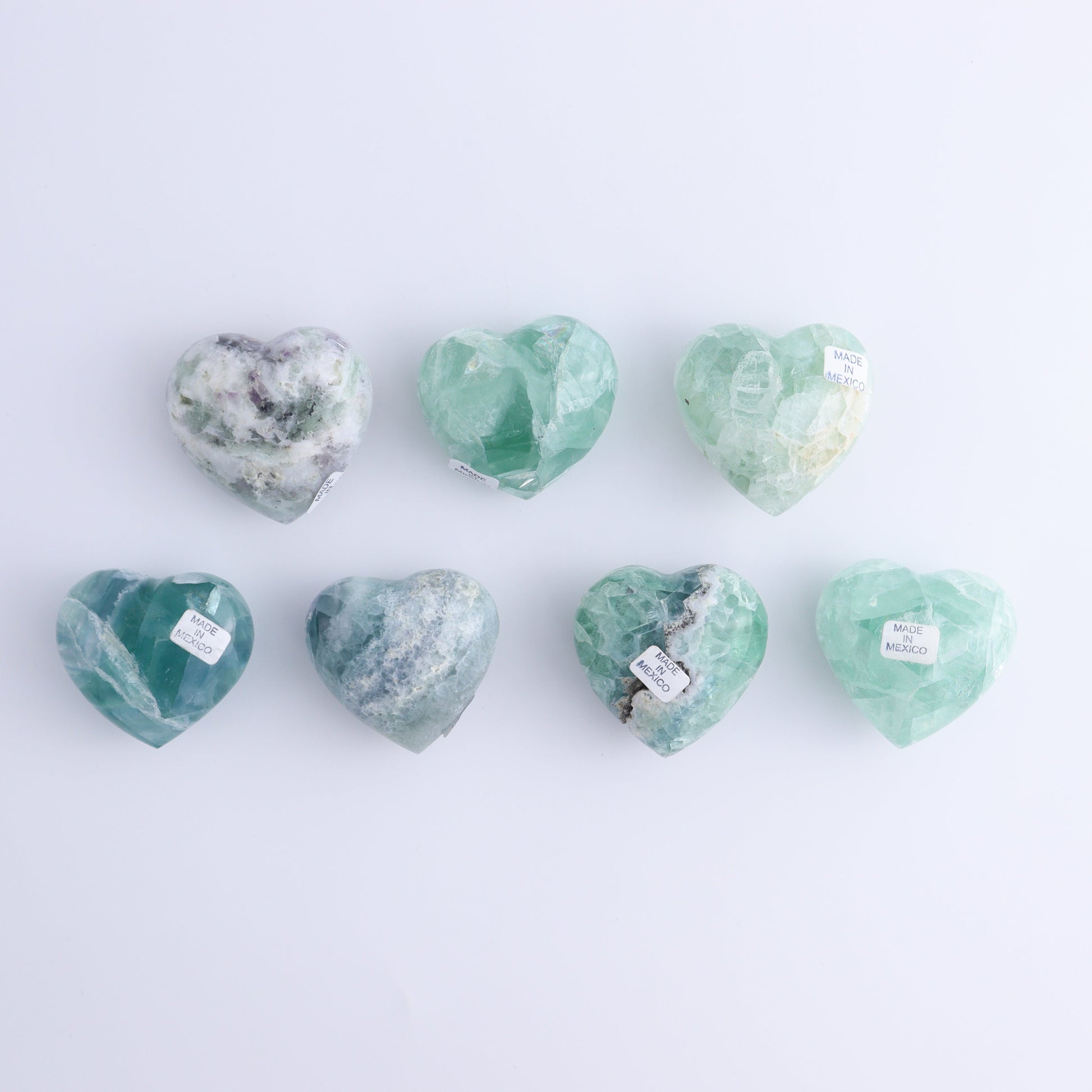 Fluorite Hearts Set of 7 - Expert Wholesale and Supplier of Wholesale Crystals & Bulk Gemstones, ["Fluorite","Hearts","Mexico"]