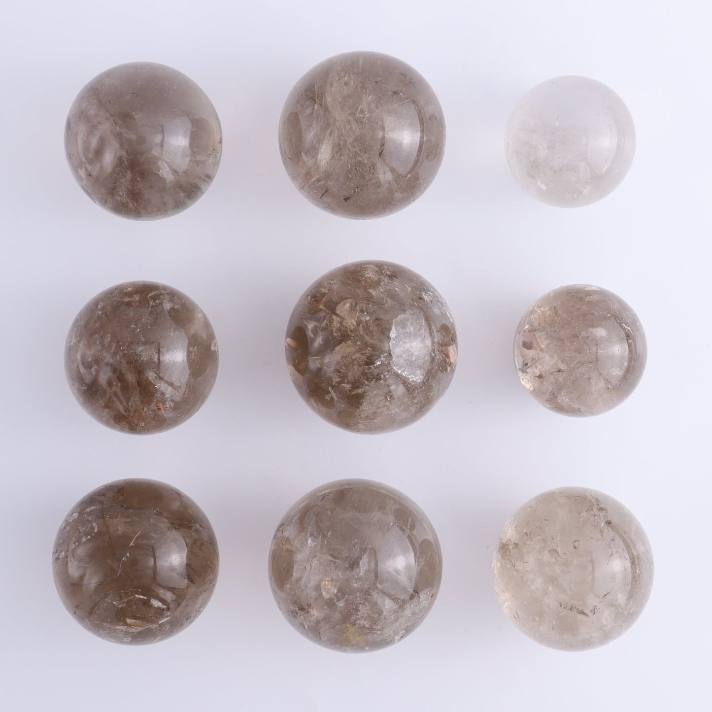 Smoky Quartz Spheres Set of 9 - Expert Wholesale and Supplier of Wholesale Crystals & Bulk Gemstones, ["Quartz","Smoky Quartz","Spheres"]