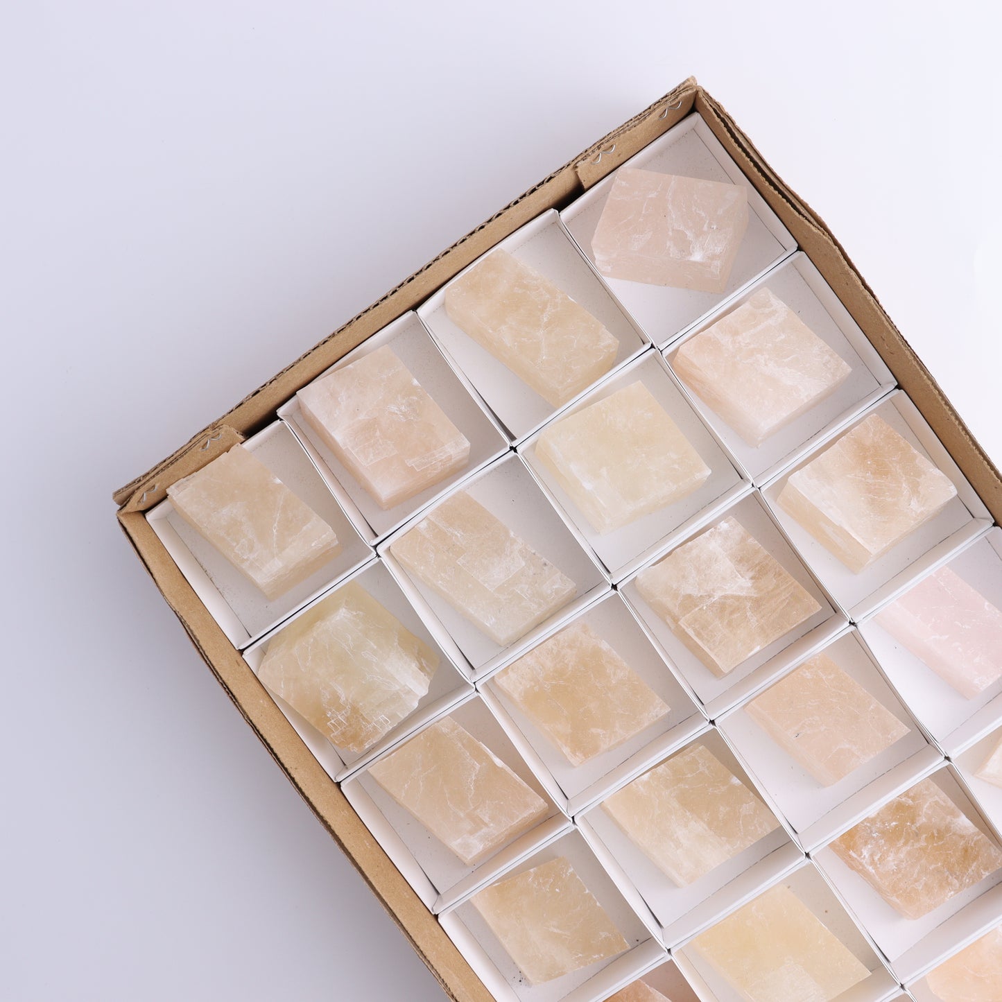 Pink Optical Calcite (Fluorescent) Set of 24 - Expert Wholesale and Supplier of Wholesale Crystals & Bulk Gemstones, ["Calcite","Mexico","Optical Calcite"]