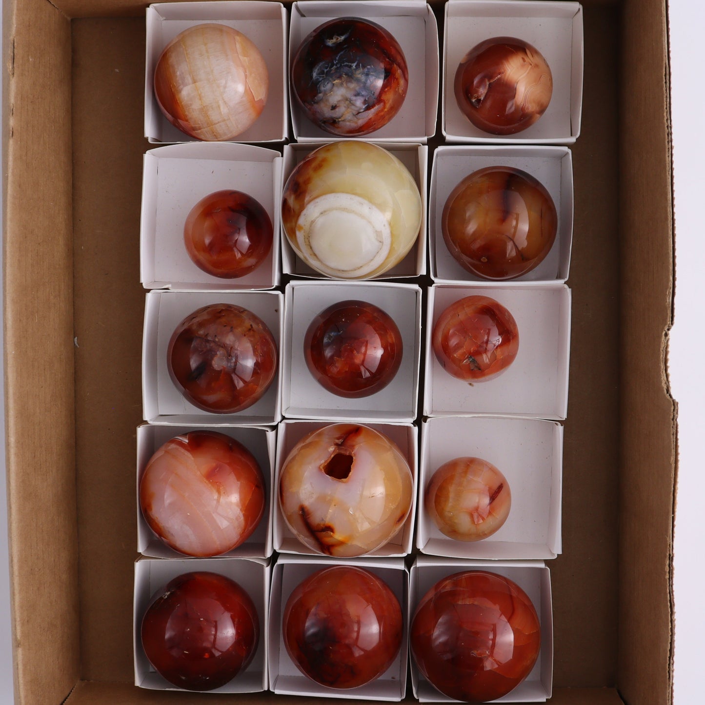 Carnelian Spheres Set of 15 - Expert Wholesale and Supplier of Wholesale Crystals & Bulk Gemstones, ["carnelian","close_30","flames","Madagascar"]