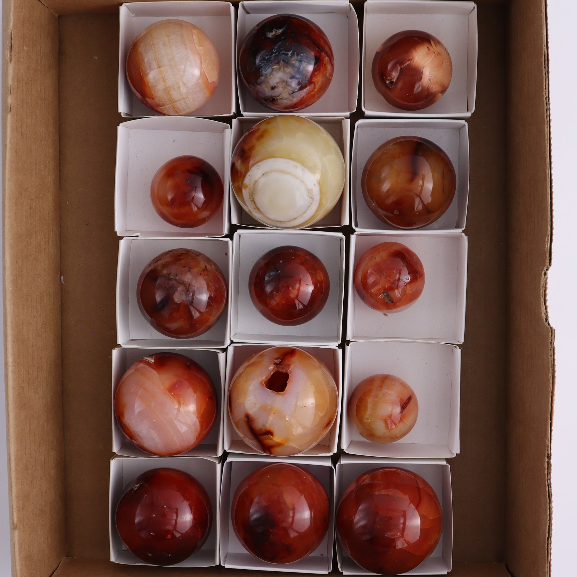 Carnelian Spheres Set of 15 - Expert Wholesale and Supplier of Wholesale Crystals & Bulk Gemstones, ["carnelian","close_30","flames","Madagascar"]