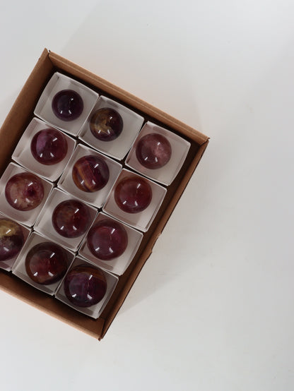 Fluorite Spheres Set of 12 - Expert Wholesale and Supplier of Wholesale Crystals & Bulk Gemstones, []