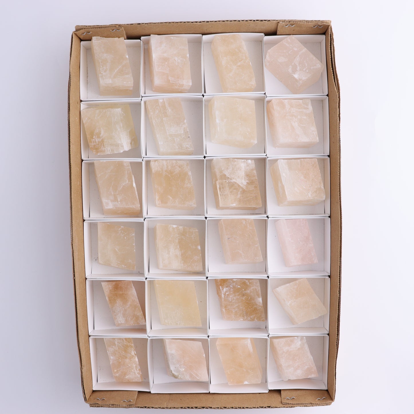 Pink Optical Calcite (Fluorescent) Set of 24 - Expert Wholesale and Supplier of Wholesale Crystals & Bulk Gemstones, ["Calcite","Mexico","Optical Calcite"]
