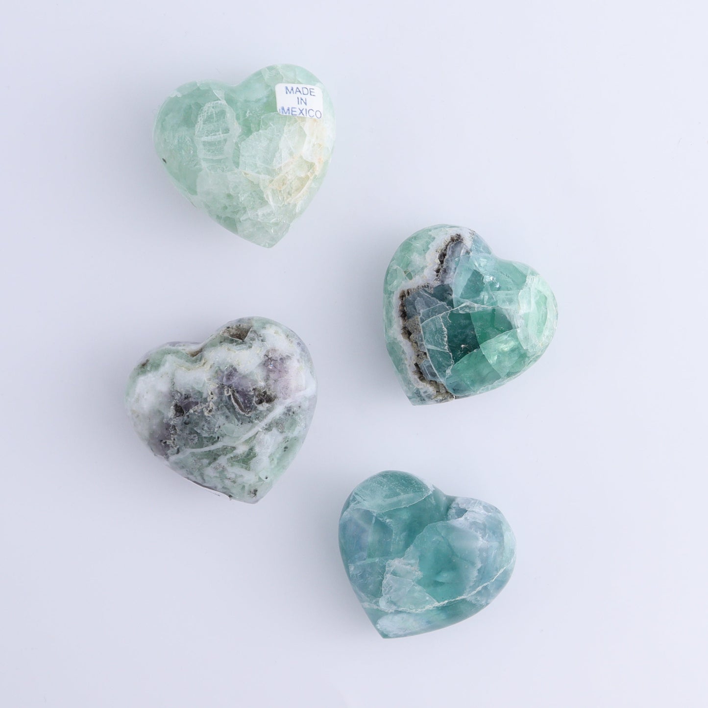 Fluorite Hearts Set of 7 - Expert Wholesale and Supplier of Wholesale Crystals & Bulk Gemstones, ["Fluorite","Hearts","Mexico"]