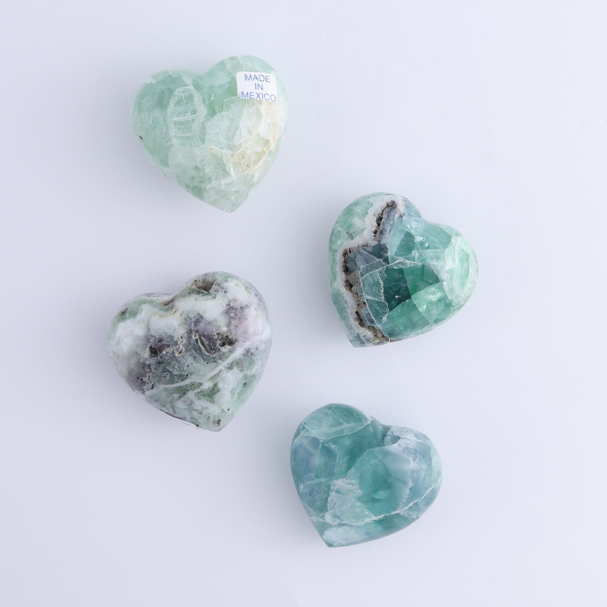 Fluorite Hearts Set of 7 - Expert Wholesale and Supplier of Wholesale Crystals & Bulk Gemstones, ["Fluorite","Hearts","Mexico"]