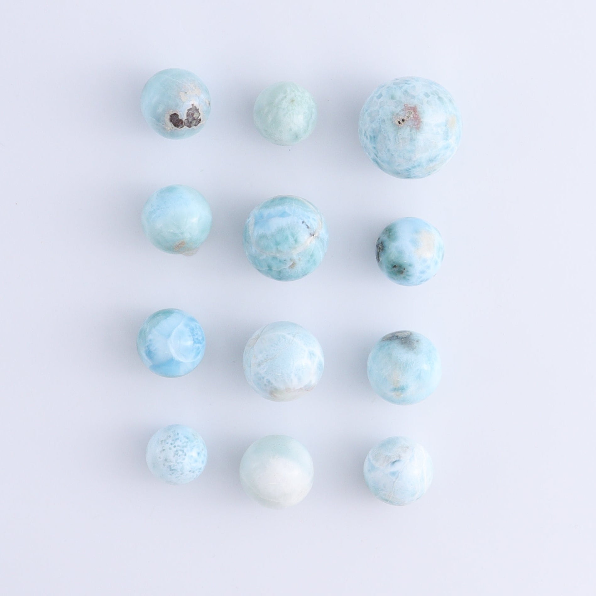 Larmiar Spheres Set of 12 - Expert Wholesale and Supplier of Wholesale Crystals & Bulk Gemstones, ["Larimar","Spheres"]