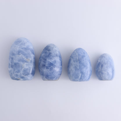Blue Calcite Freeforms Set of 4 - Expert Wholesale and Supplier of Wholesale Crystals & Bulk Gemstones, ["Blue Calcite","Calcite","close_30","Freeform","Freeforms"]