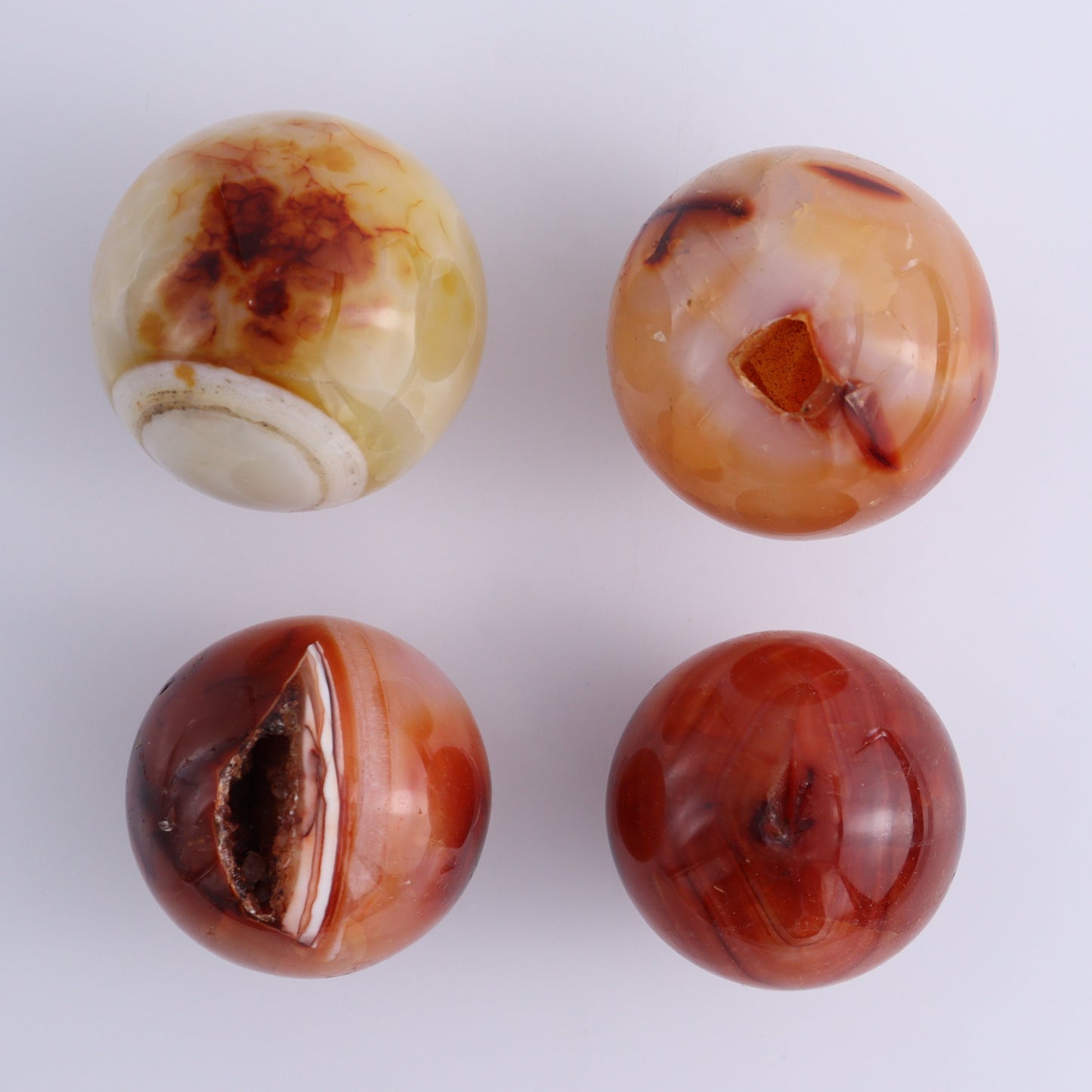 Carnelian Spheres Set of 15 - Expert Wholesale and Supplier of Wholesale Crystals & Bulk Gemstones, ["carnelian","close_30","flames","Madagascar"]