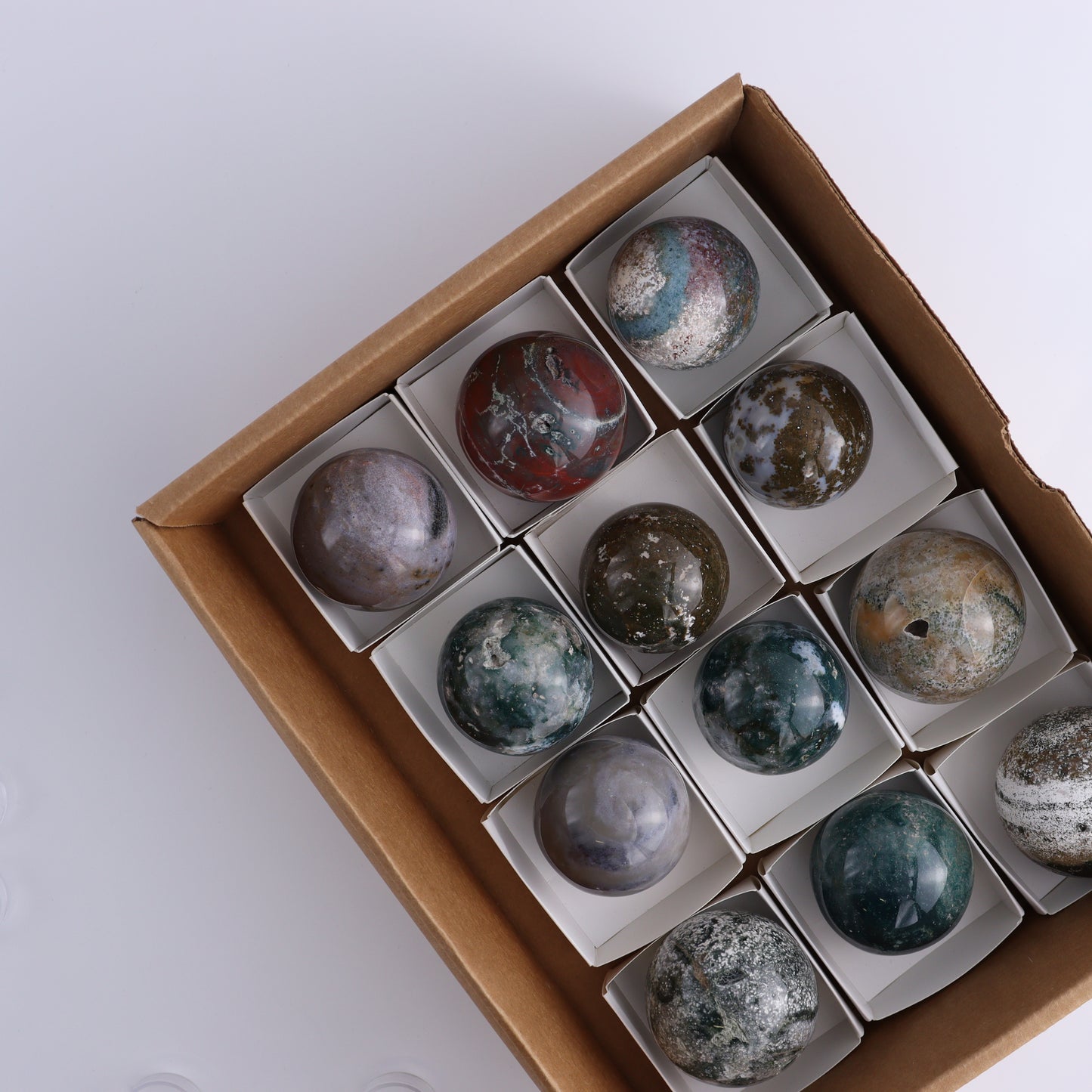 Ocean Jasper Spheres Set of 12 - Expert Wholesale and Supplier of Wholesale Crystals & Bulk Gemstones, ["jasper","Madagascar","Ocean Jasper","Spheres"]