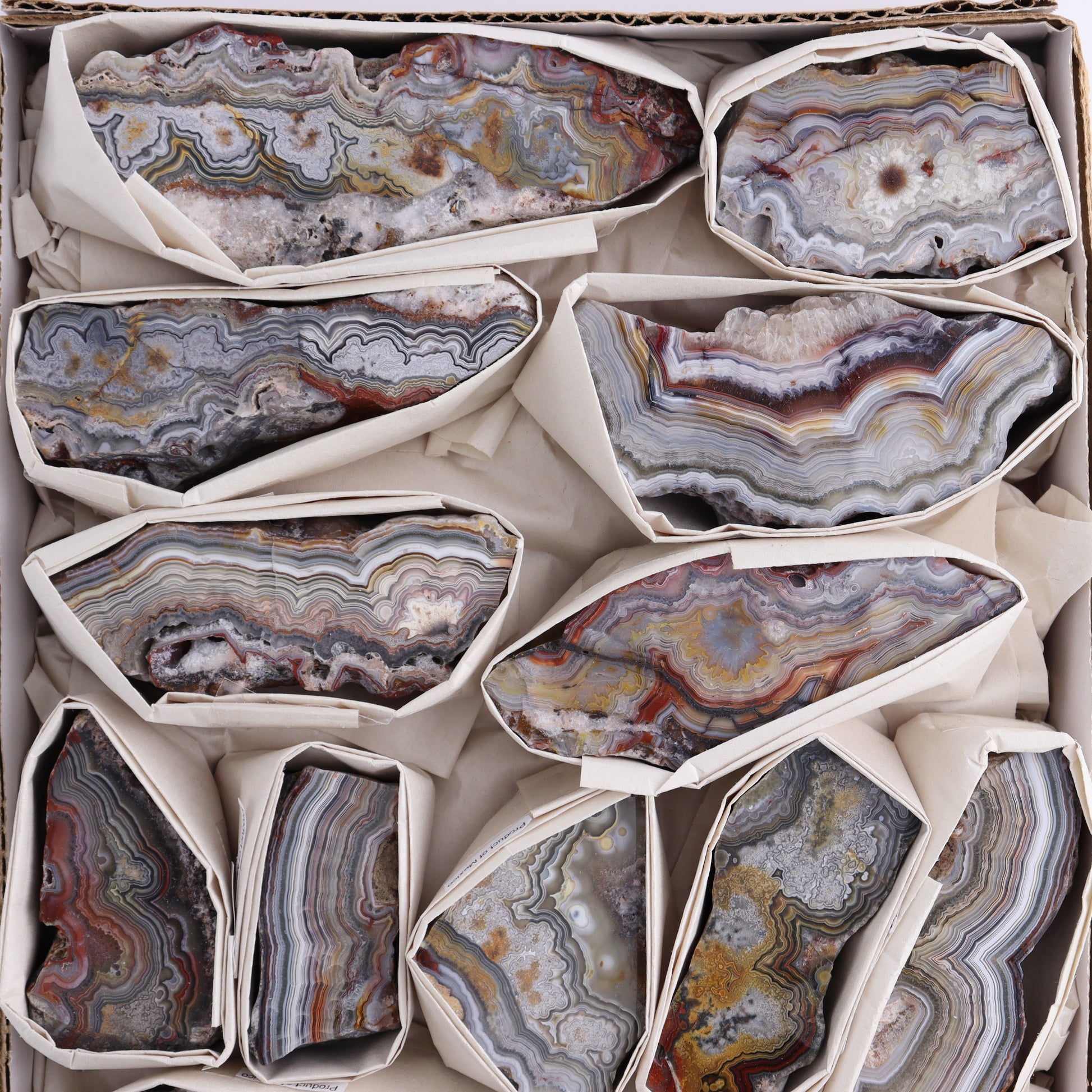 Crazy Lace Agate Flat of 13 - Expert Wholesale and Supplier of Wholesale Crystals & Bulk Gemstones, ["Crazy Lace Agate","Mexico"]