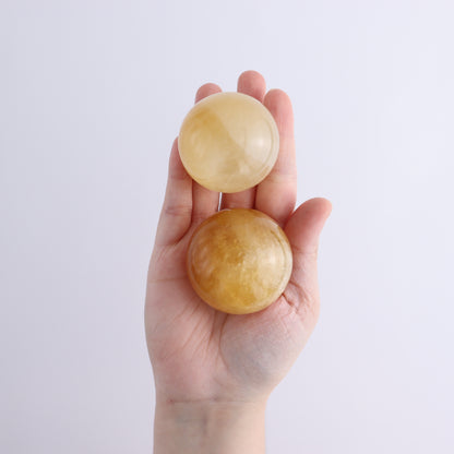 Honey Calcite Spheres Set of 12 - Expert Wholesale and Supplier of Wholesale Crystals & Bulk Gemstones, ["Calcite","Honey Calcite","Mexico","Spheres"]